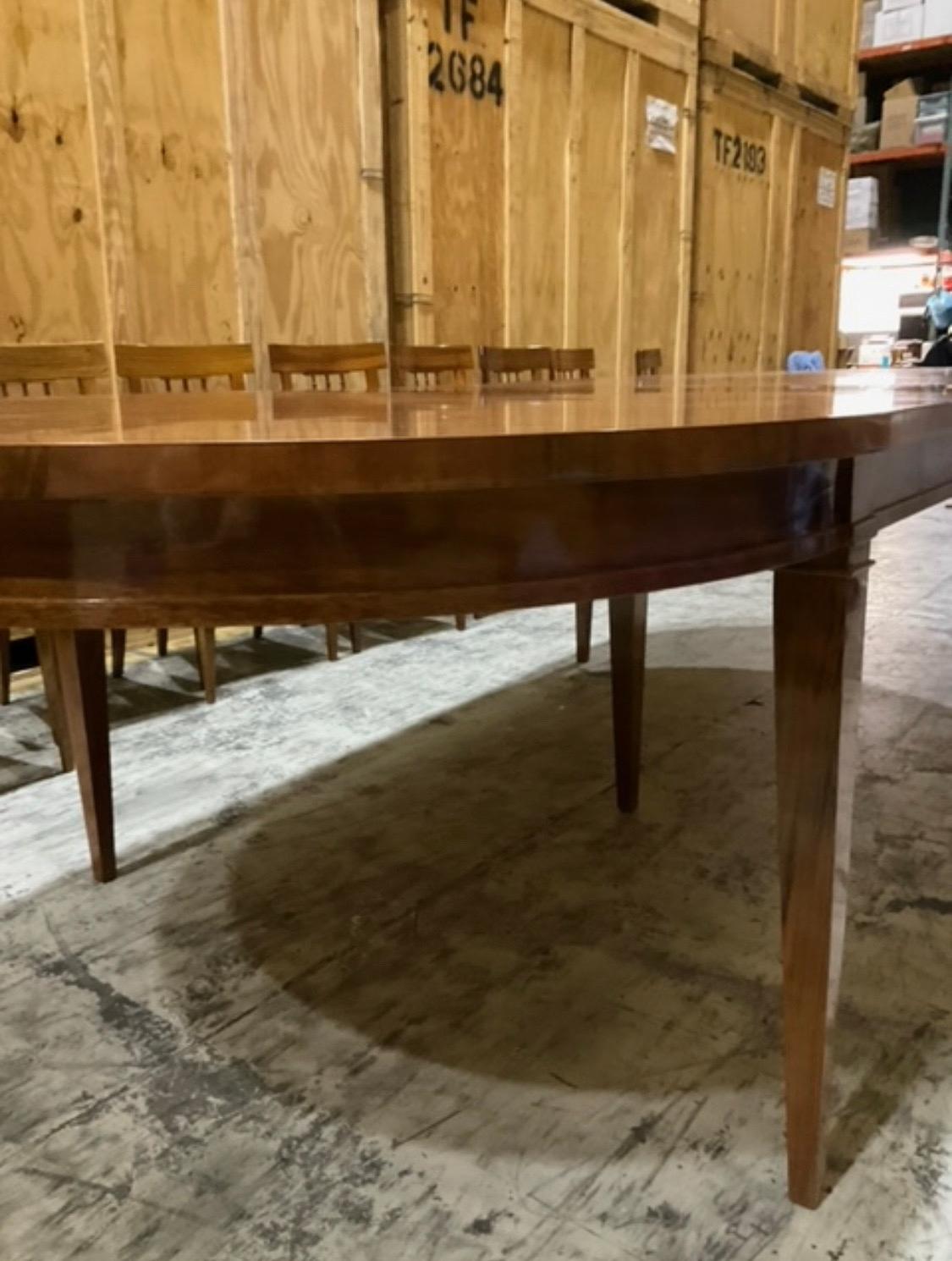 20th century Biedermeier style walnut dining table Handmade by fine Biedermeier dealer Alois Hummel from Germany. Walnut with lighter inlay banding on top, tapered straight legs. A very high quality Biedermeier reproduction fabricated by Alois