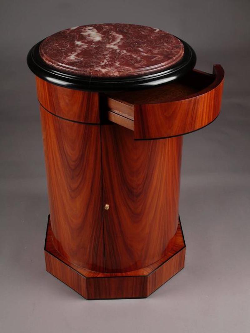 20th Century Biedermeier Style Rotunda Cupboard
Rotunda cupboard in Biedermeier style.
Tulip Veneer on solid pinewood, partially ebonized.

(G-Sam-70).