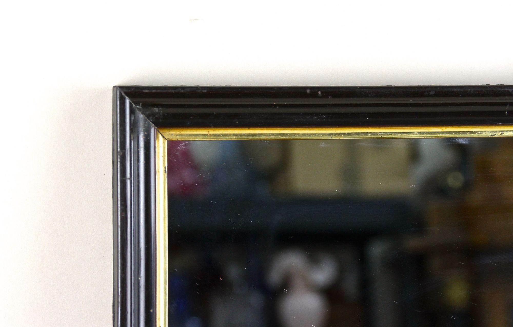 Art déco 20e siècle Miroir Art Deco noir avec barreaux dorés, laqué, Autriche vers 1920 en vente