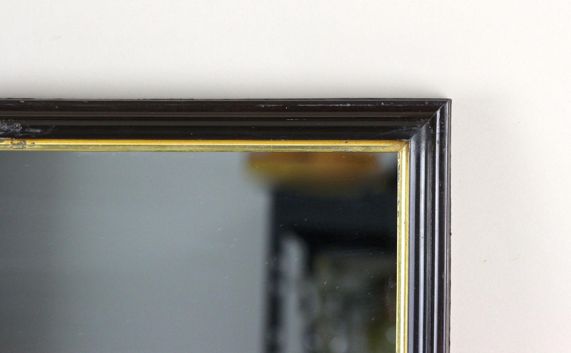 Doré 20e siècle Miroir Art Deco noir avec barreaux dorés, laqué, Autriche vers 1920 en vente