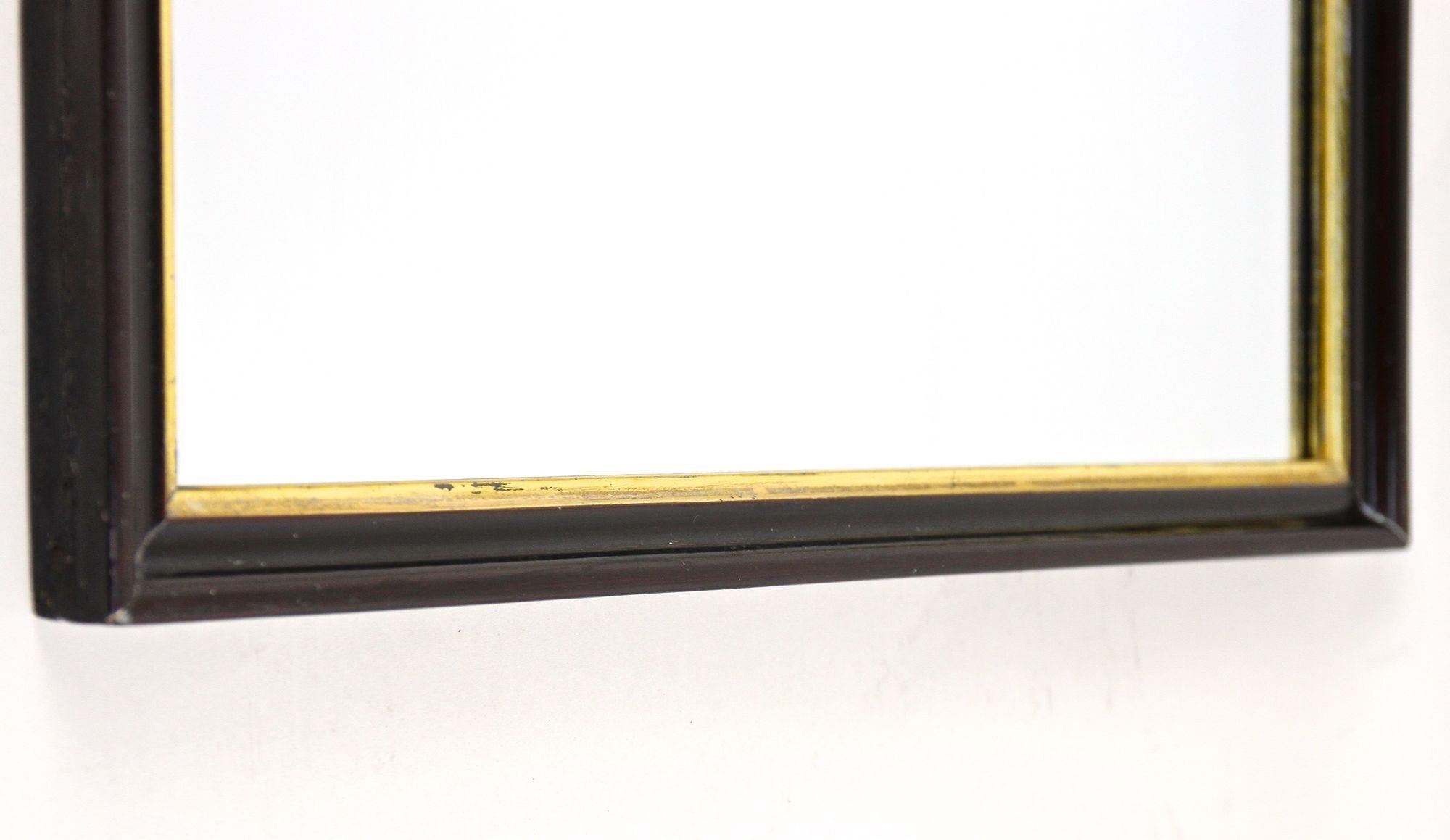 20ième siècle 20e siècle Miroir Art Deco noir avec barreaux dorés, laqué, Autriche vers 1920 en vente