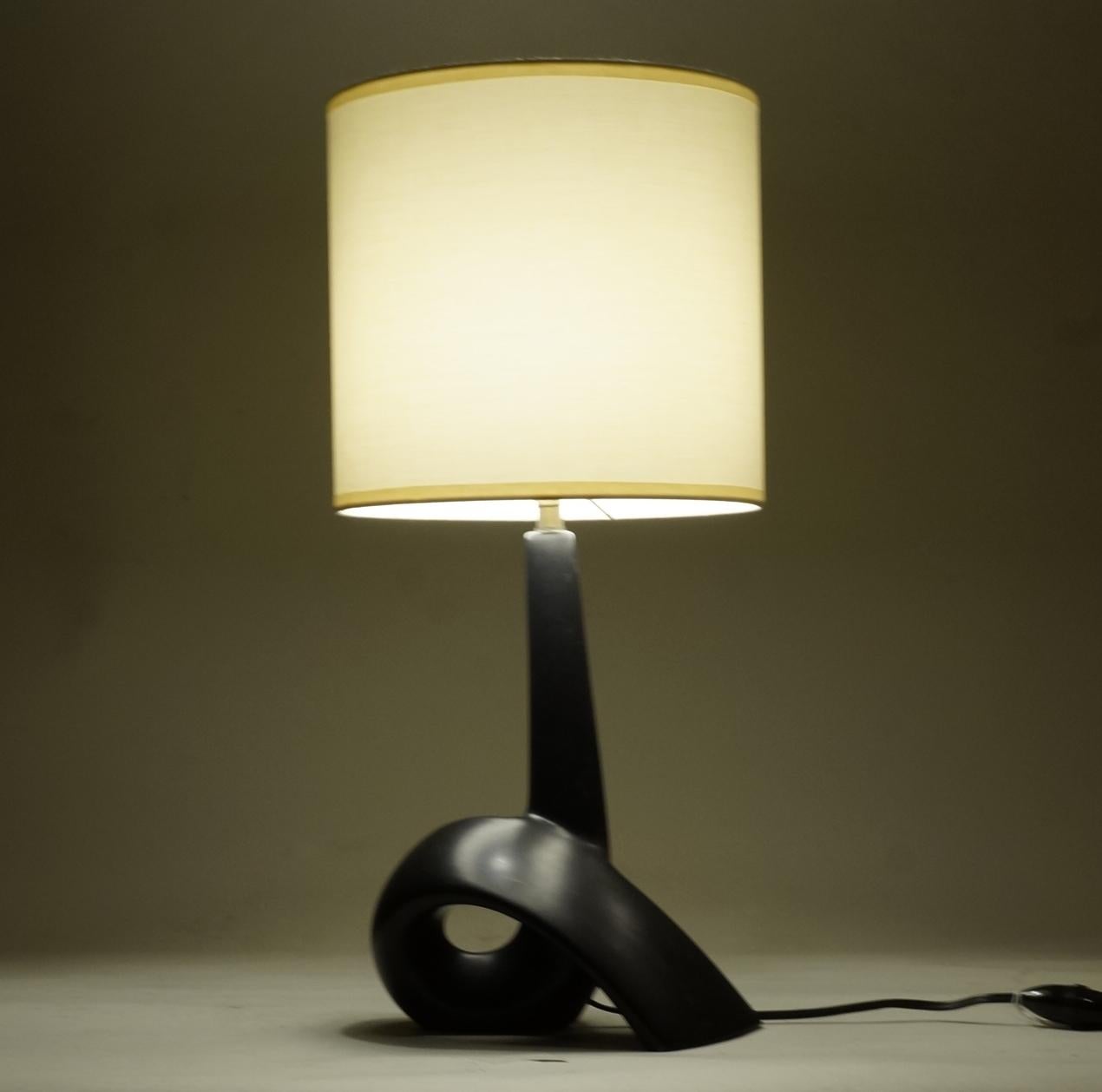 Black satin ceramic table lamp.
Custom-made fabric lampshade.
Rewired with twisted silk cord.

Ceramic body height: 26 cm-10.3 in.
Height with lampshade: 49 cm-19.3 in.