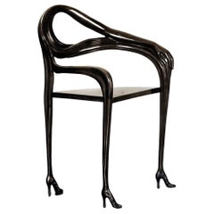 Silla negra del siglo XX "Leda" de Salvador Dalí diseño español edición limitada