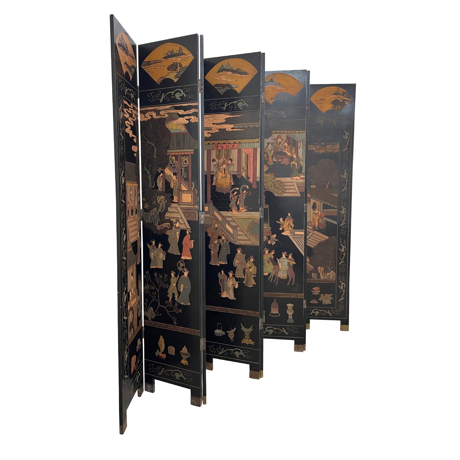 A black, vintage Chinese screen made of hand crafted lacquered wood, in good condition. The large, detailed Chinoiserie style room divider is composed with eight flexible, adjustable panels standing on short wooden feet which are inserted in