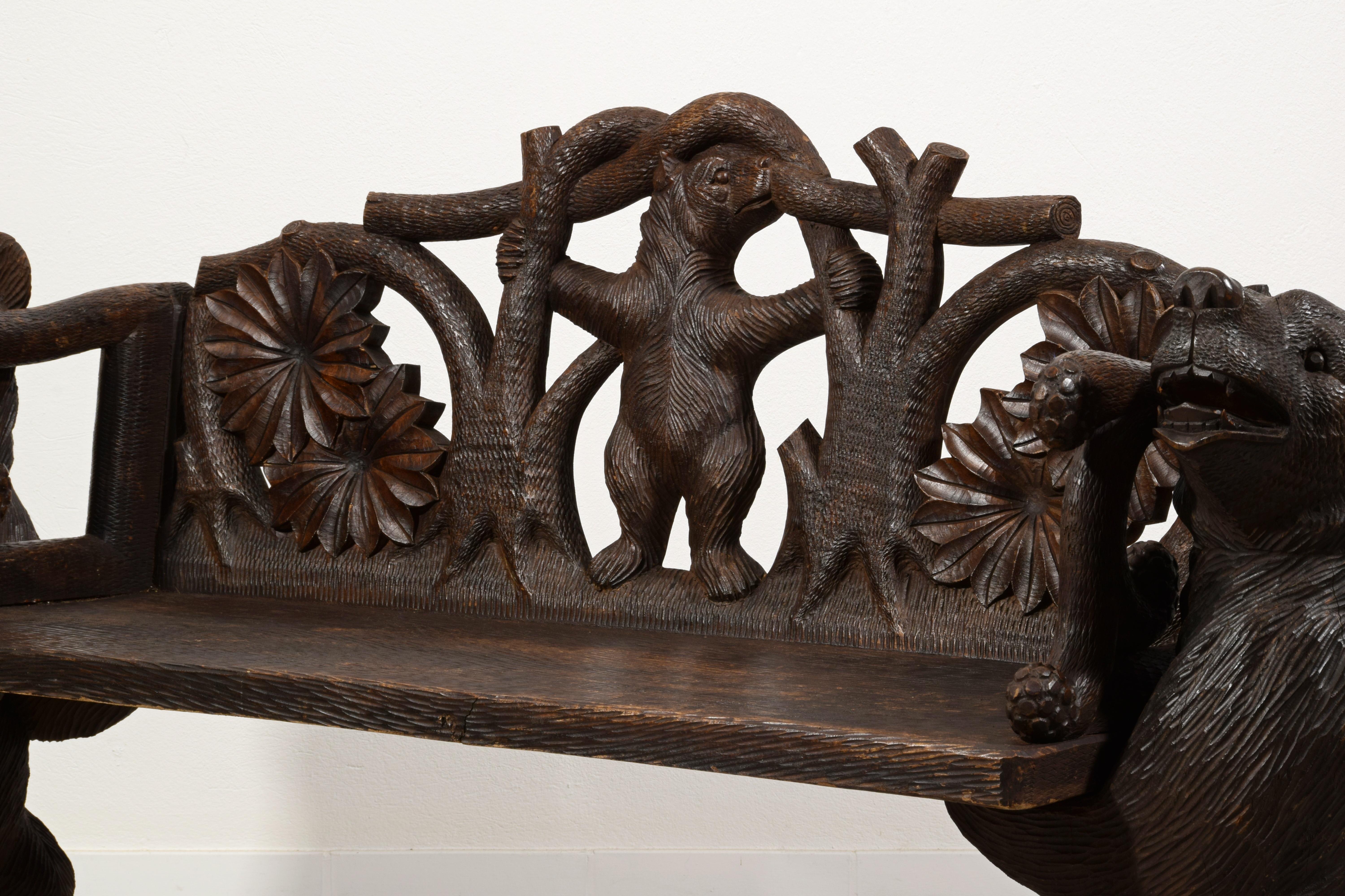 Swiss 20th century,  Black Forest Brienz Hand Carved Wood bench with Bears  For Sale