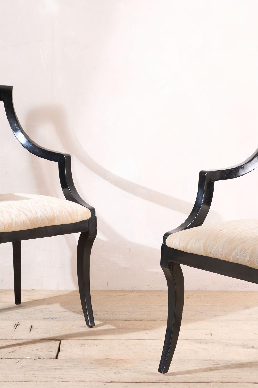 These are a lovely pair of Regency style lacquered armchairs. The design is very elegant and will work well in a huge number of interiors. The sizes make them useable for a variety of purposes as well. From carver dining chairs to matching desk