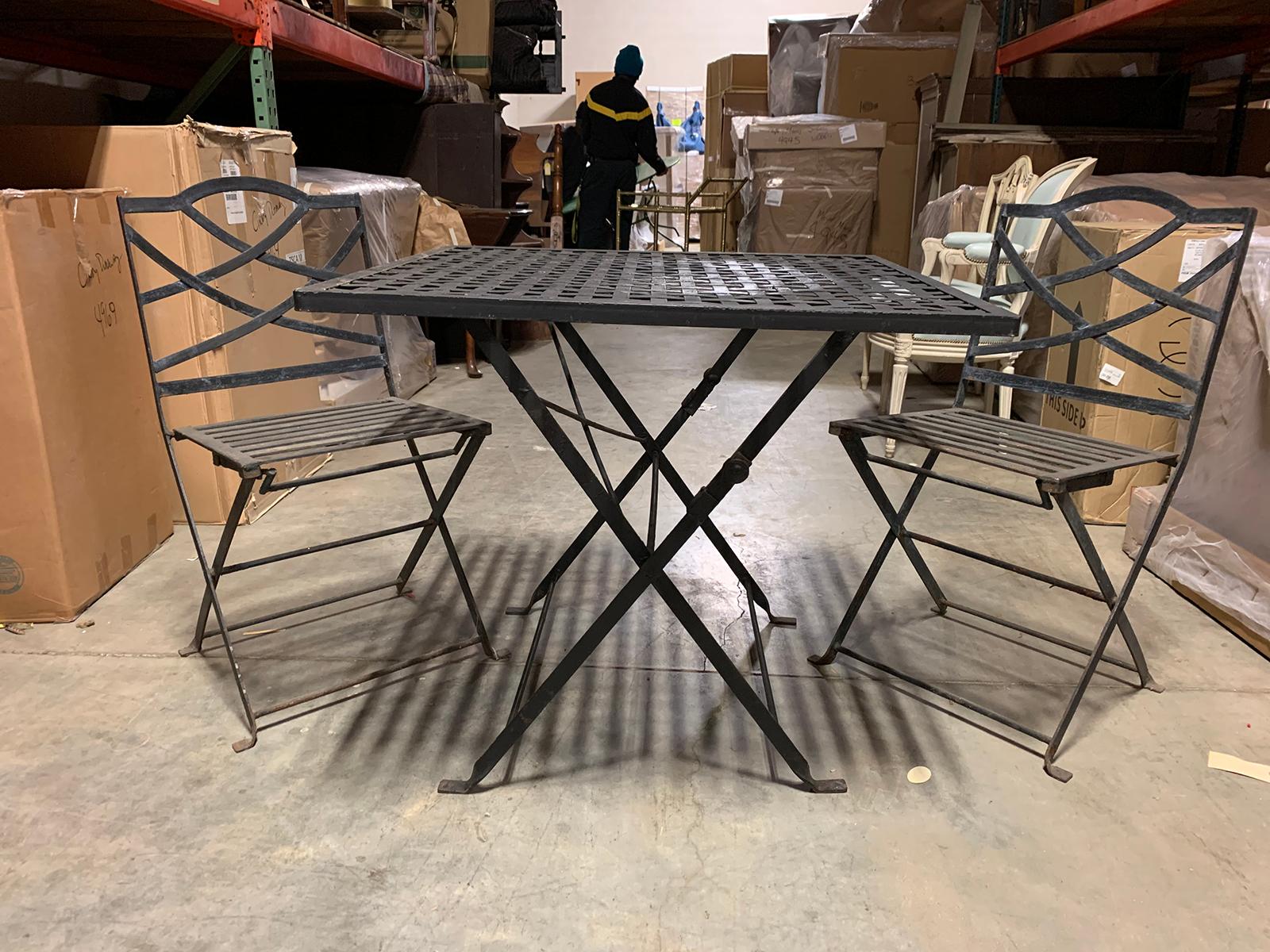20th century black metal folding breakfast table and chairs
Measures: Table: 33