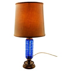 Lampe de table en verre taillé bleu et bronze du 20e siècle