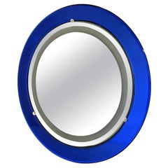 Miroir mural italien rond en verre bleu enluminé du 20ème siècle par Cristal Art