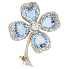 Antique 20th Century Blue Spinels Diamonds 18 Karat Yellow Gold Clover Shape Brooch
