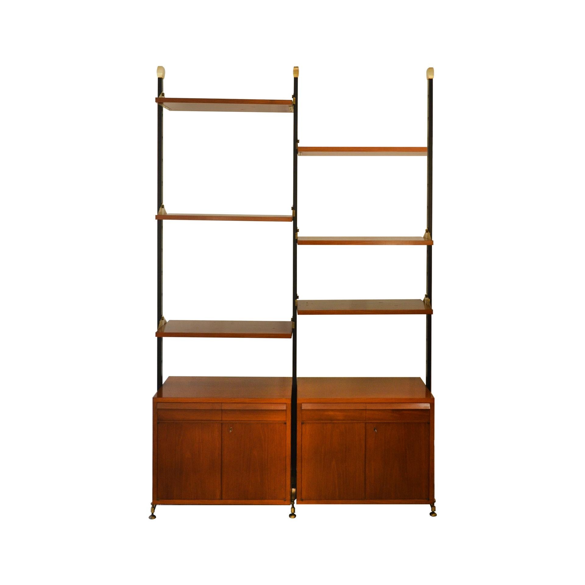 Bookcase with shelves and cabinets in wood and brass designed in 1950s, in the style of the Italian School. The bookcase has six shelves that are adjustable in height. Very good condition. Restored wood surfaces.