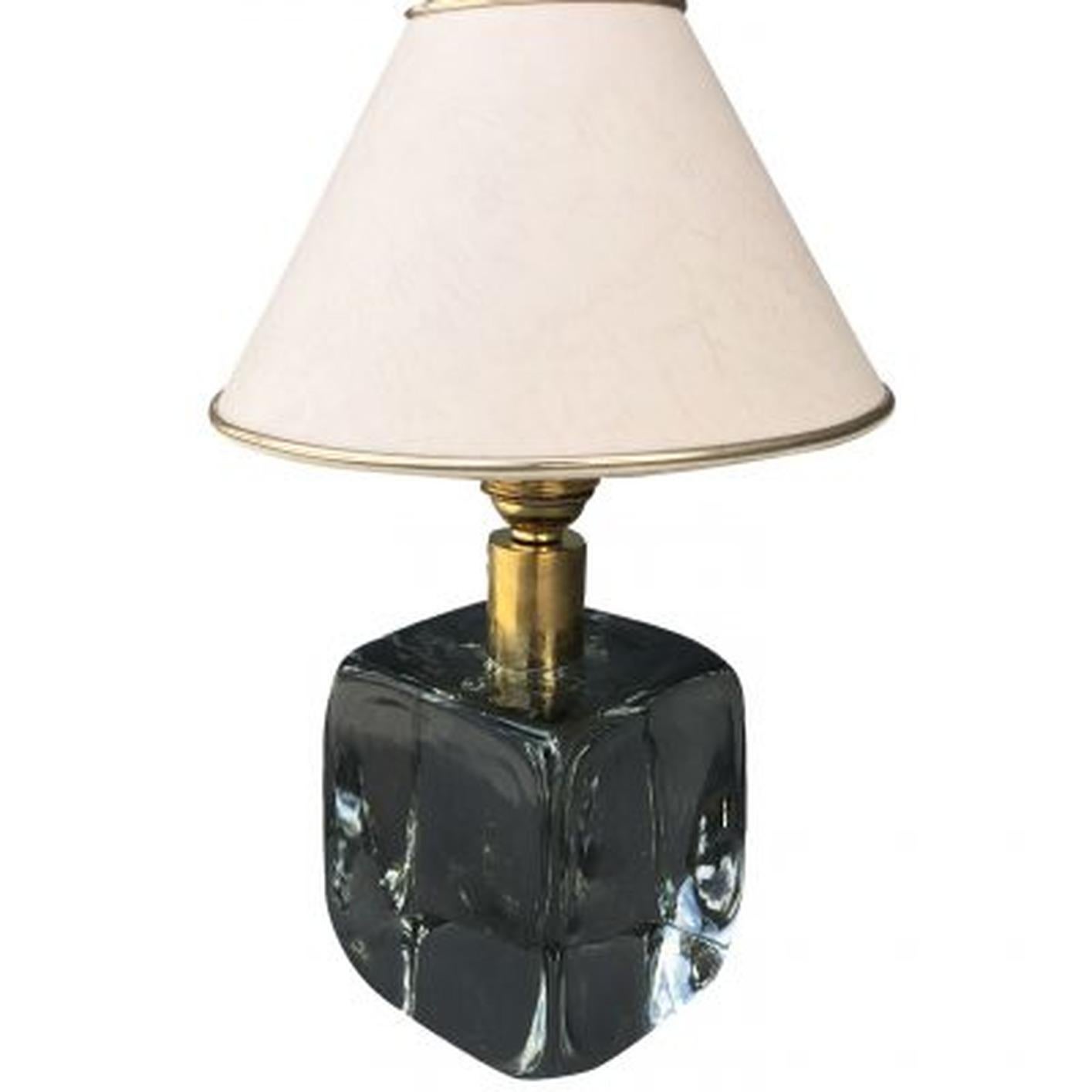 A midcentury table lamp made out of crystal glass and brass, produced by Svenskt Tenn in Sweden, designed by Josef Frank. Wear consistent with age and use, circa 1960, Sweden.

Measures: Base 4.5” H x 4.20” W x 4.20” D

Shade 5” H x 8.20” W