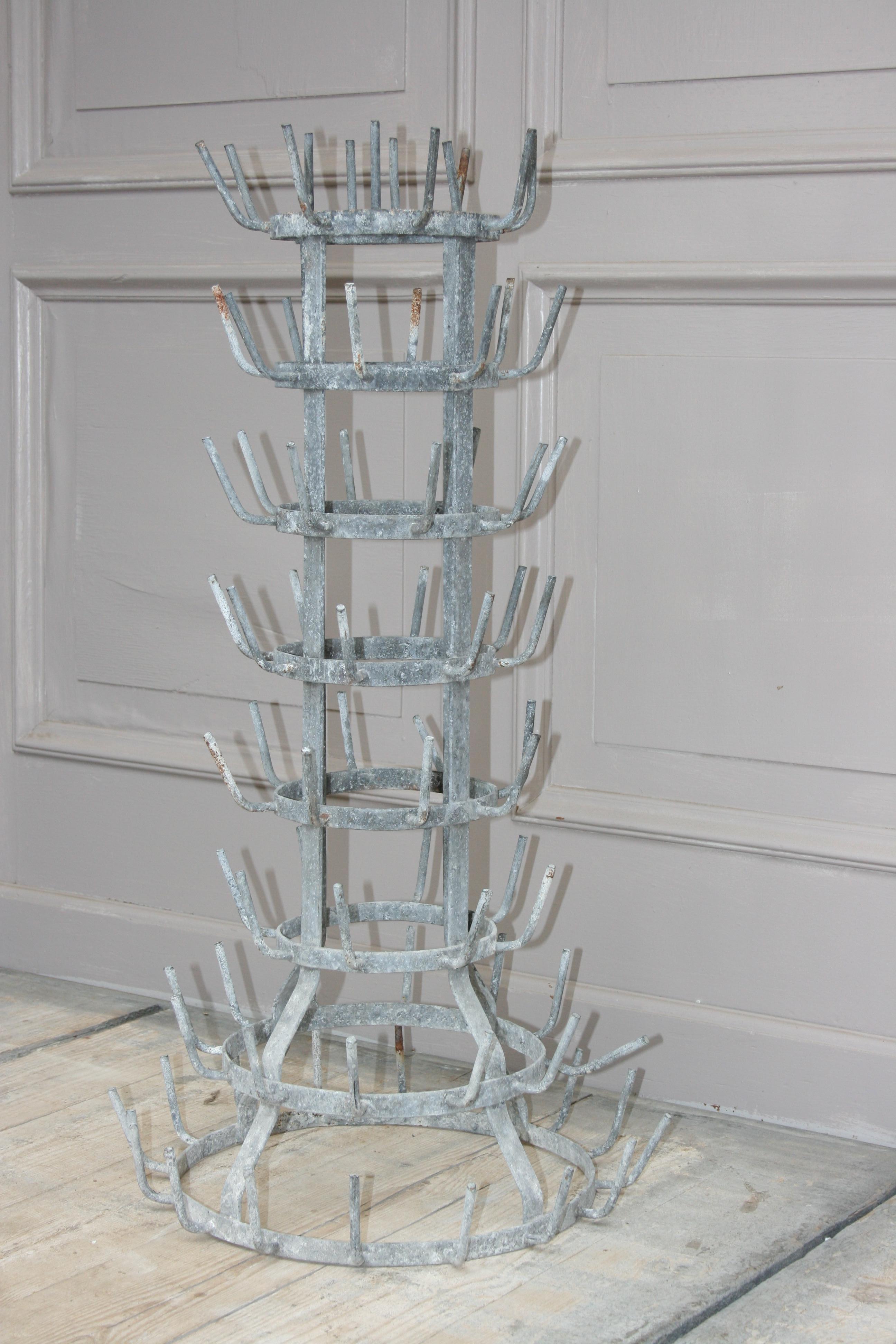 Original vintage bottle dryer or bottle holder in the style of the well-known 