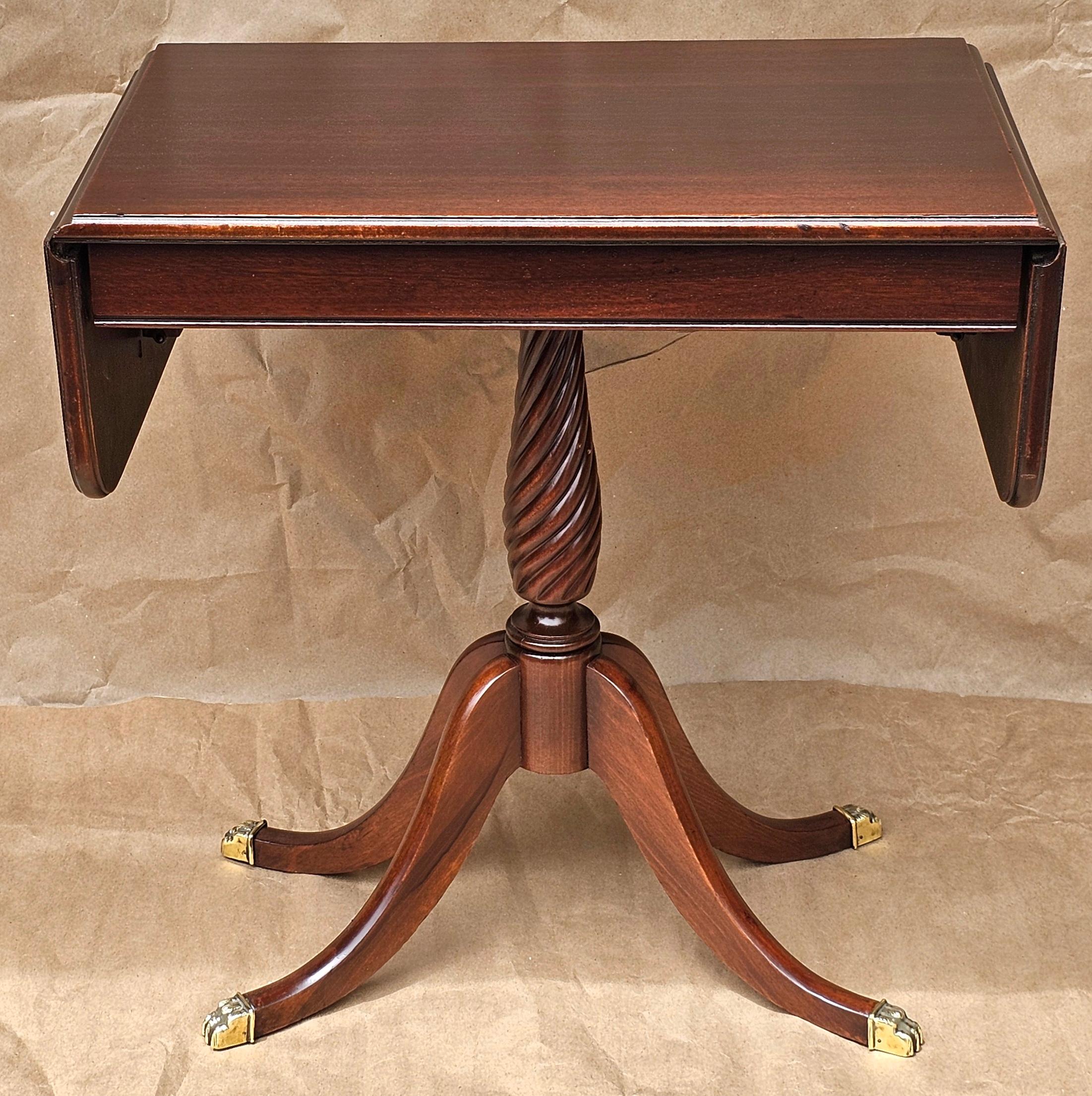 A Mid 20th Century Brandt Fueniture Mahogany Pedestal Quad Pod Drop-Leaf Side Table, Newly refinihed. 
Measures 35