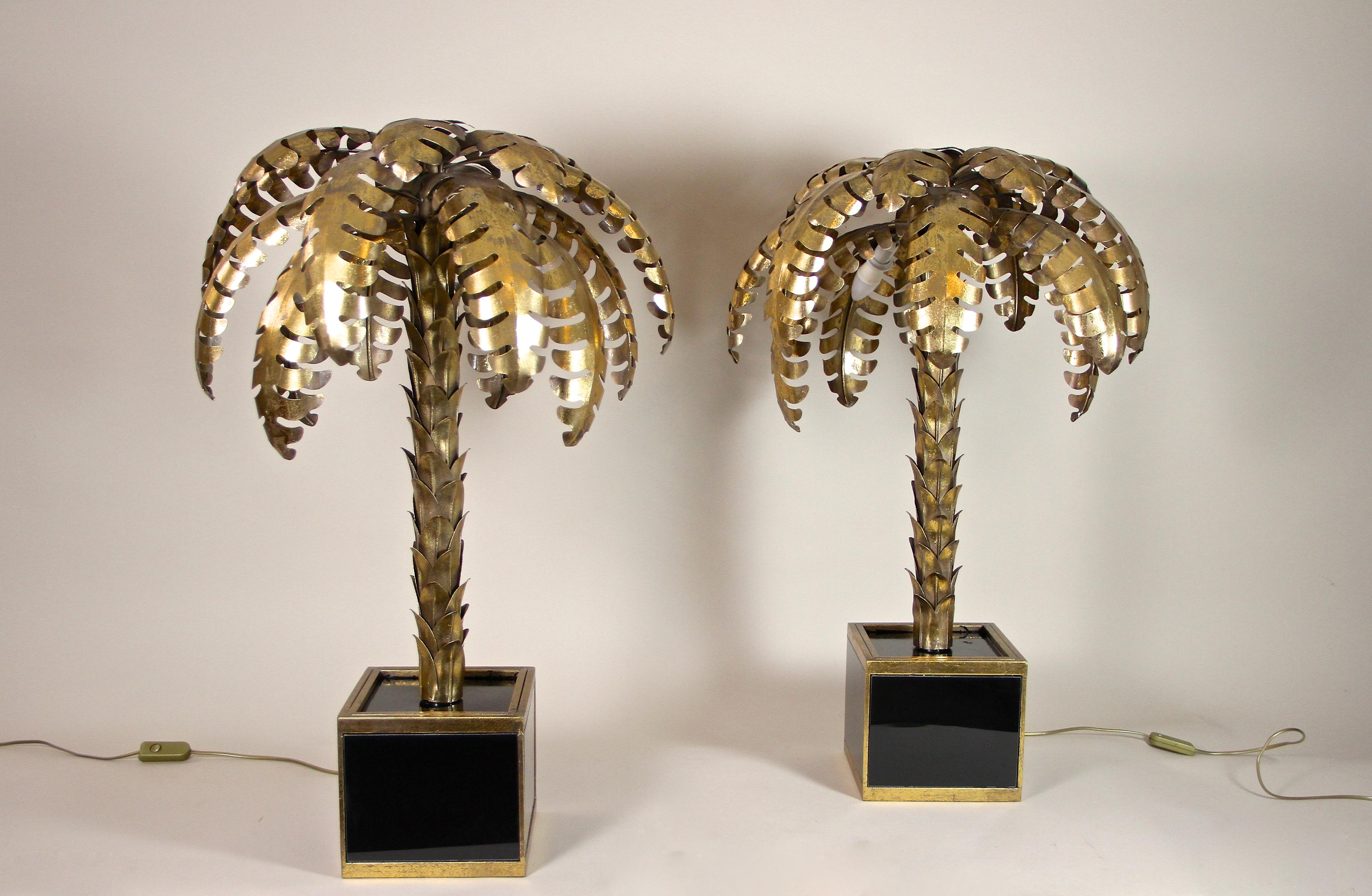 Exceptional pair of 1970s Brass Palm table lamps attributed to Maison Jansen in France. made out of brass around 1970, these artfully shaped table lamps are true design icons. This matchless Hollywood Regency style lamps impress with a fantastic