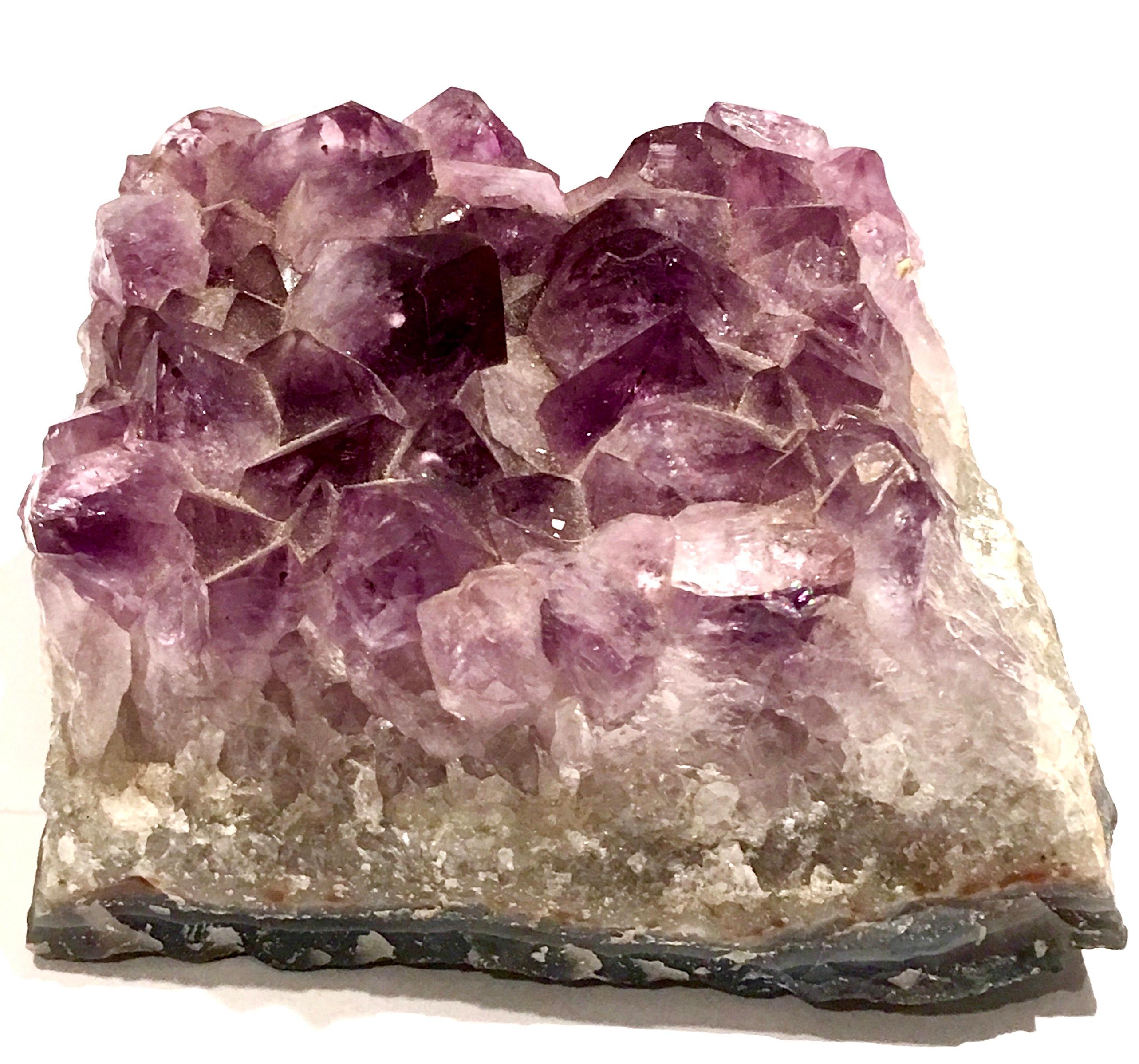 20th century Brazilian amethyst geode specimen and paperweight. This fragment is 6.25 inches diameter.
