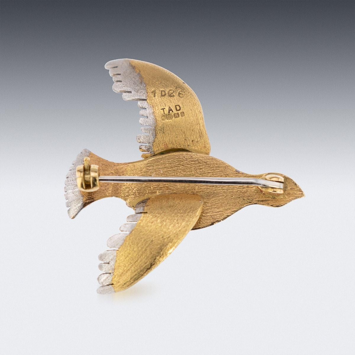 Vintage 20th Century British 18k three-colour gold brooch, realistically modelled as a grouse in flight, the eyes are set with small emerald. Hallmarked English 18k gold (750 standard), Birmingham, year 1964 (P), Maker T.A.D.

CONDITION
In Great