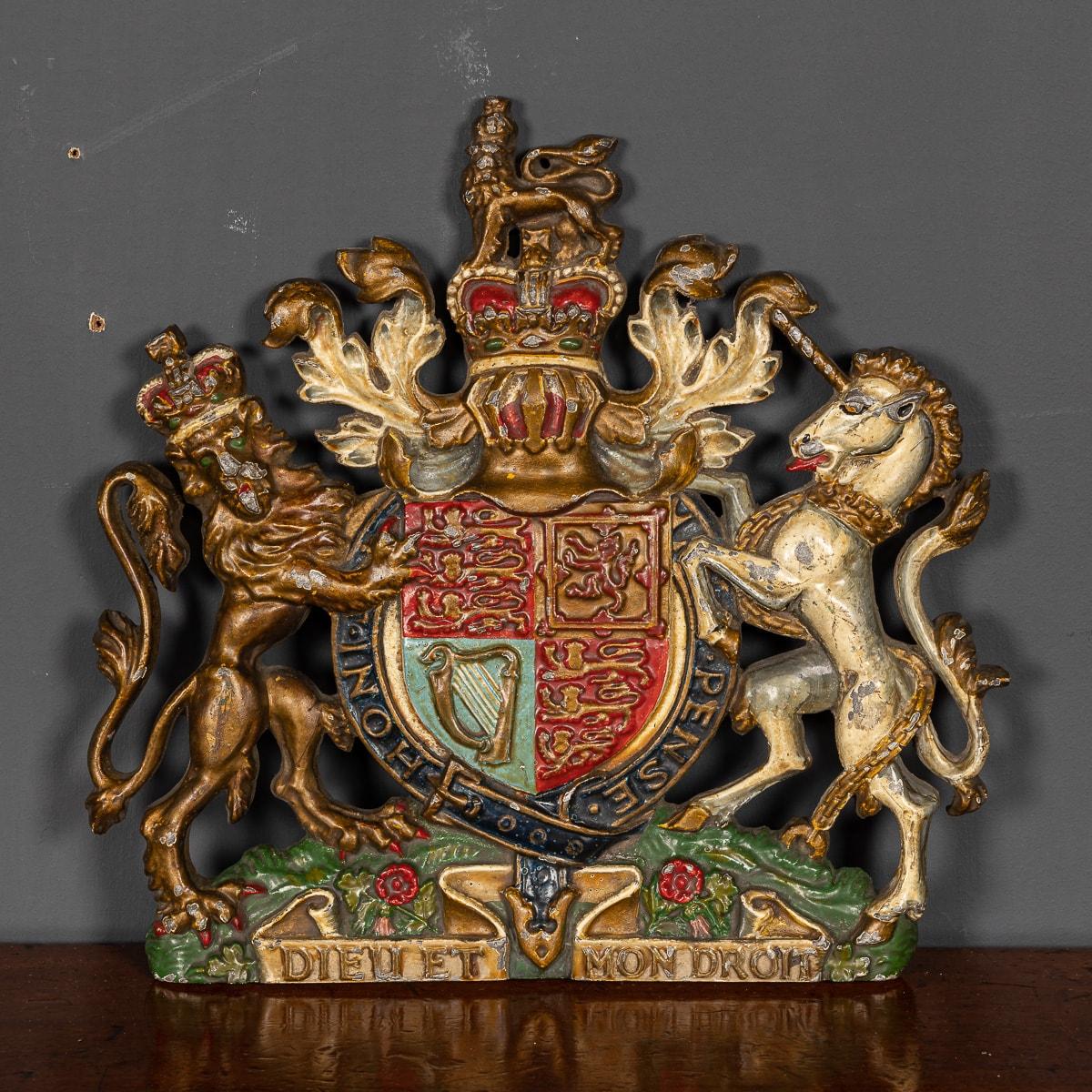 Superb 20th Century large and impressive, beautifully hand painted, cast iron English Royal Warrant, presented by Queen Elizabeth II to a retailer for a services to herself or her household. An incredible piece of history and a very decorative