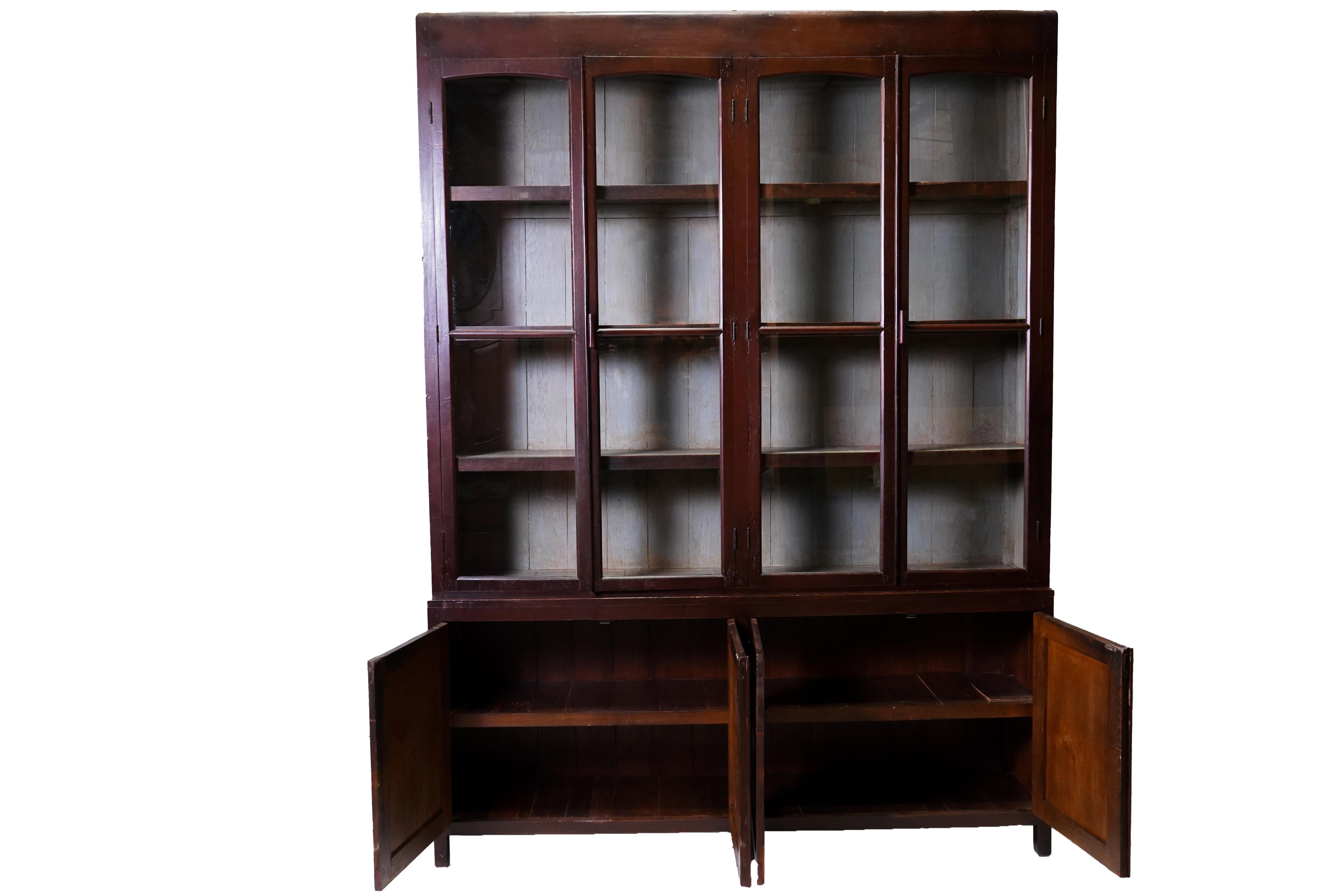 Teak 20th Century British Colonial Bookcase with Bottom Storage For Sale