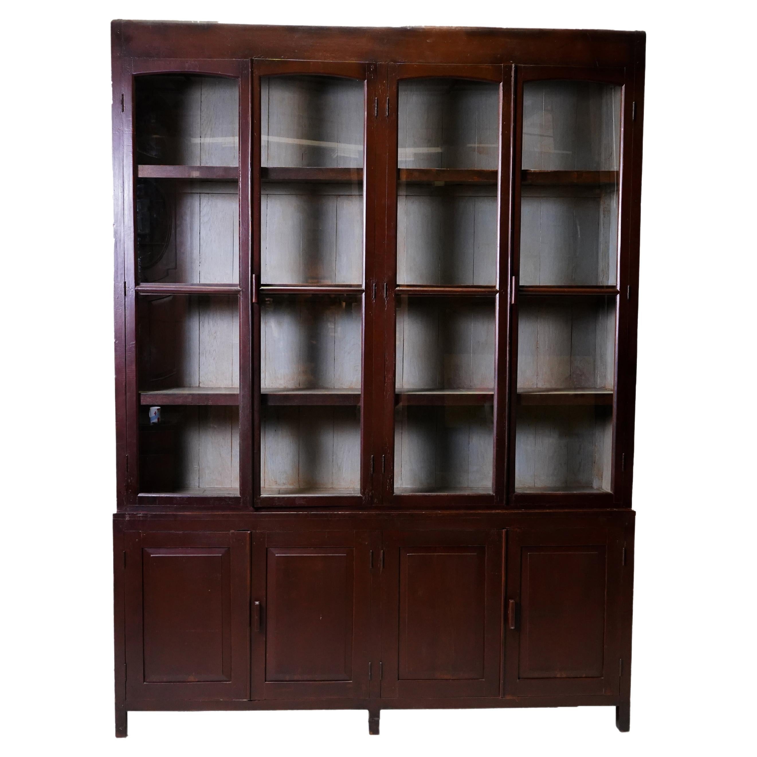 20th Century British Colonial Bookcase with Bottom Storage For Sale