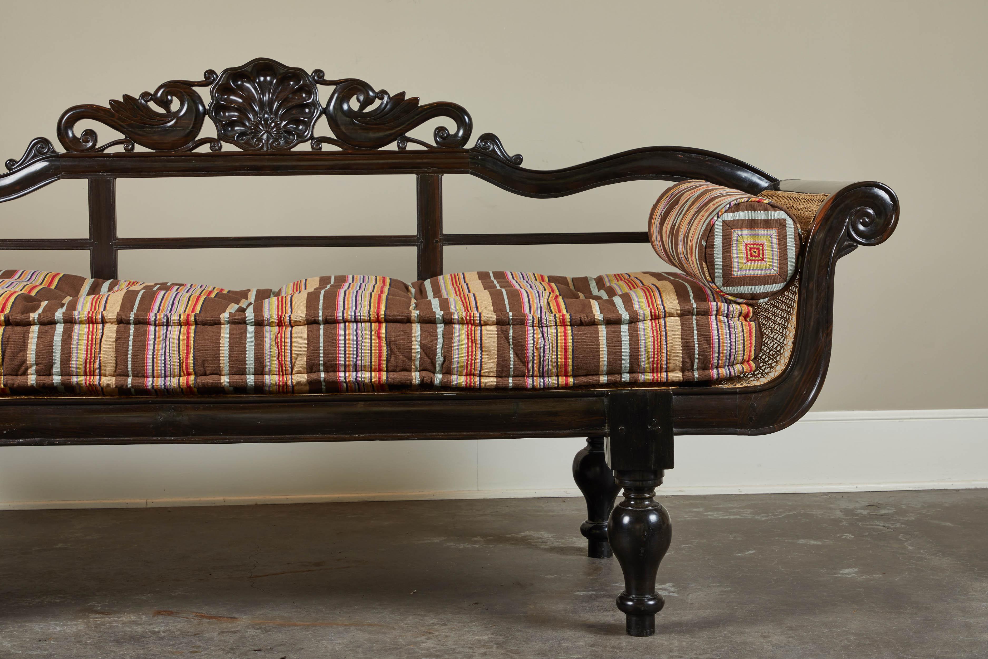 Anglo-Indian 20th Century British Colonial Ebony Bench with Caned Seat and Arms