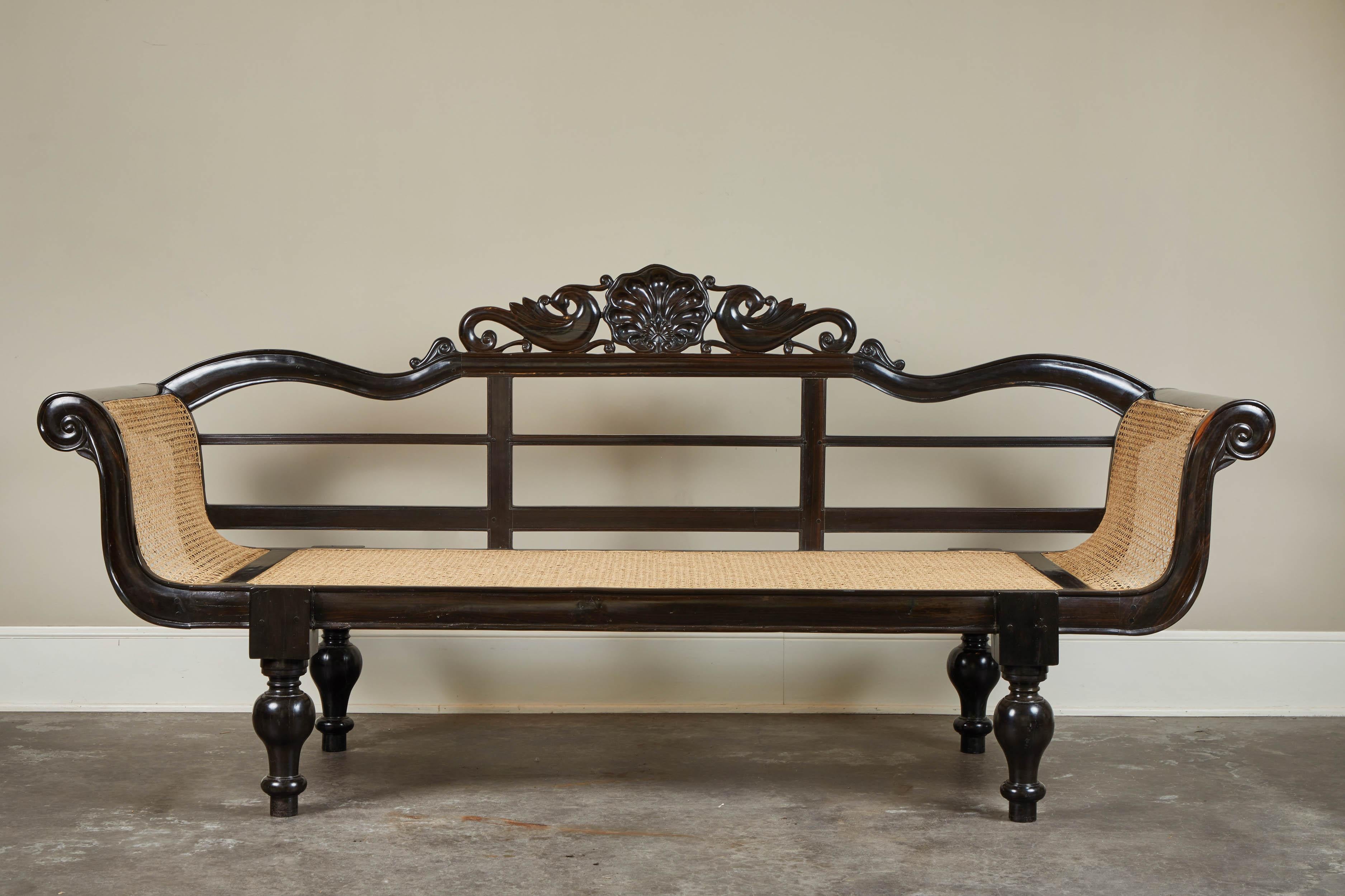 20th Century British Colonial Ebony Bench with Caned Seat and Arms In Good Condition In Pasadena, CA