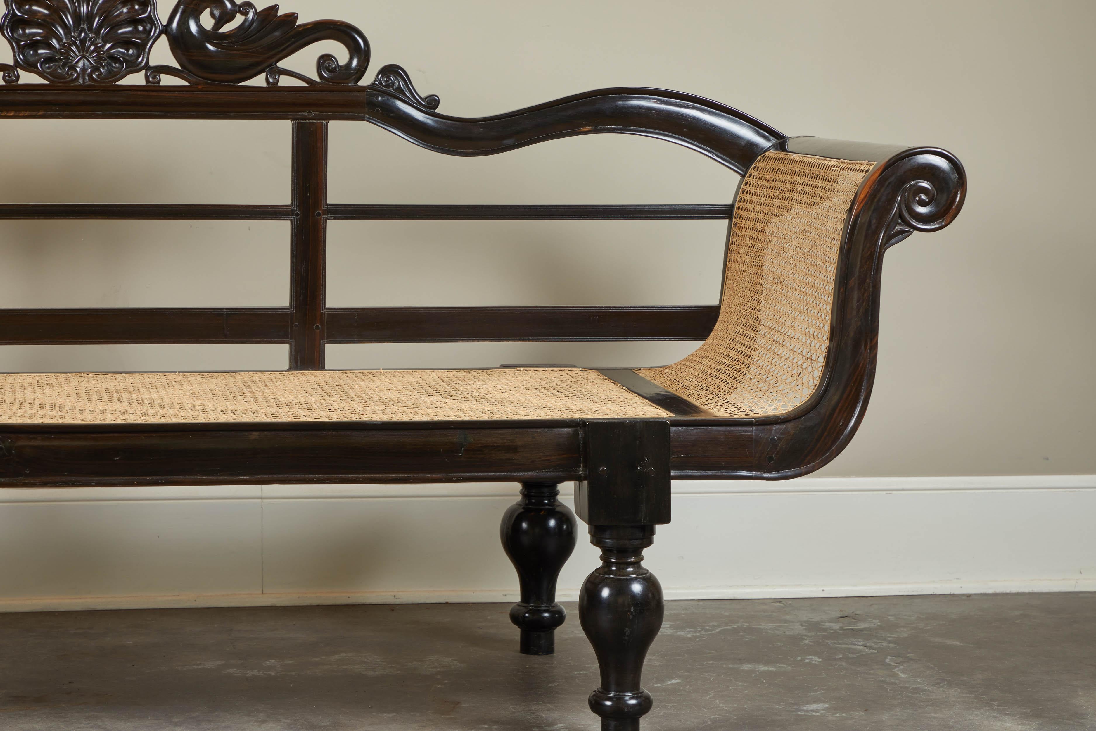 20th Century British Colonial Ebony Bench with Caned Seat and Arms 1