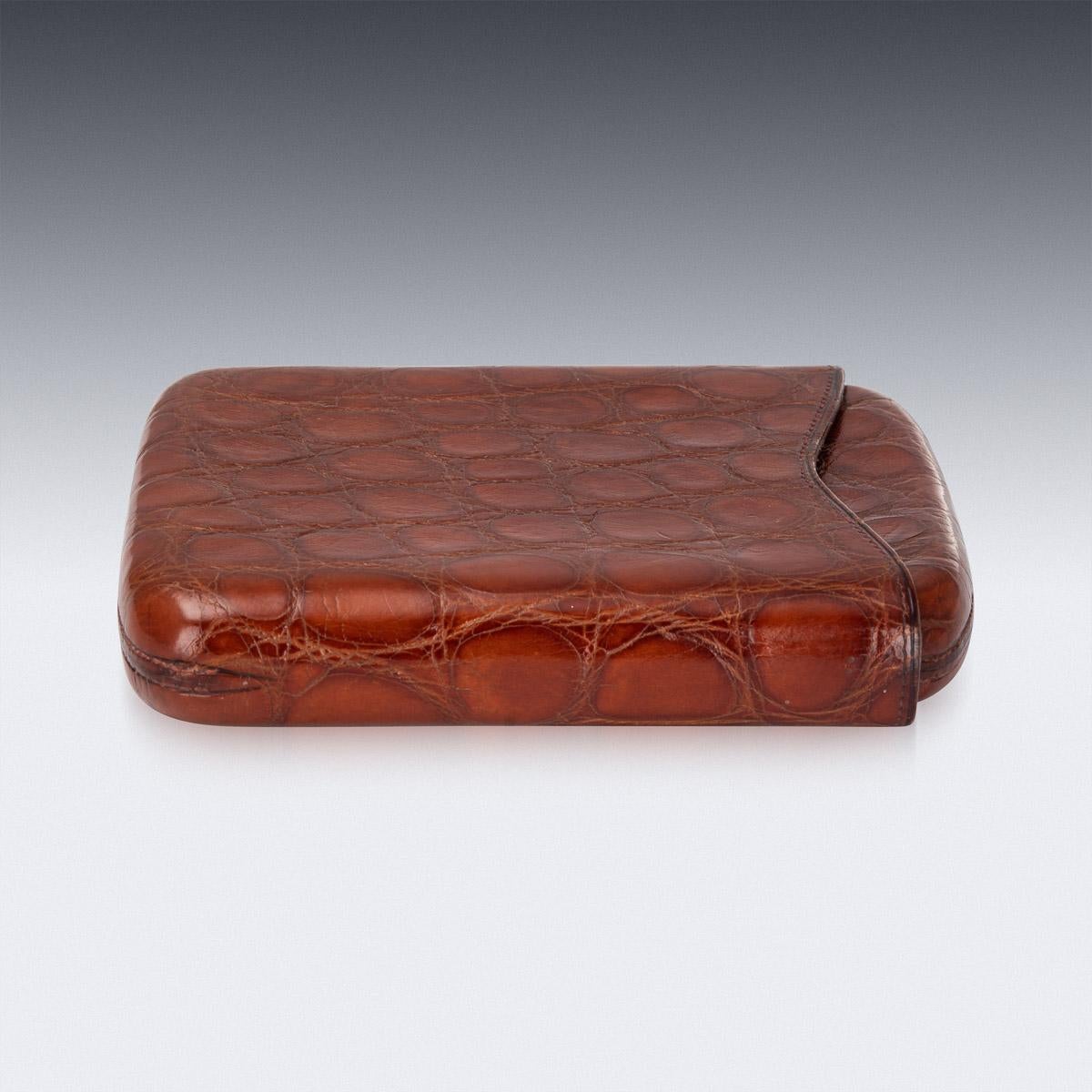 Stylish early-20th century British made sumptuous crocodile leather cigar case, of rounded rectangular form, with a pull off lid and interior that is sufficient for five mid-size cigars.

Measures: Length 13.5cm
Width 10.5 x 2.5cm
Weight 110g.