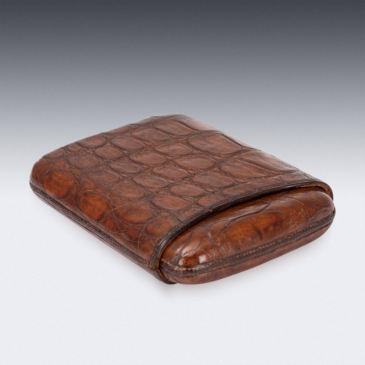 Stylish early 20th century British made sumptuous crocodile leather cigar case, of rounded rectangular form, with a pull off lid and interior that is sufficient for five mid-size cigars. A real conversation piece and a superb piece of history