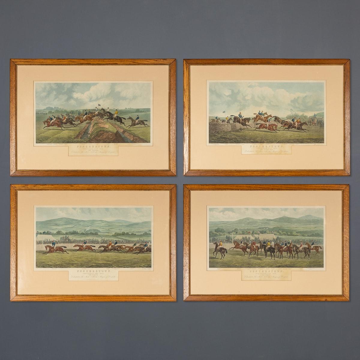 Antique early 20th Century complete series of the famous Conyngham Cup 1872 painted by John Sturgess and engraved by EG Hester. These oak framed hand coloured Aquatints show the Punchestown Racecourse in four fine pictures “The start” in which