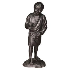 escultura oriental japonesa antigua de bronce del siglo XX Fumador de pipa, 1970