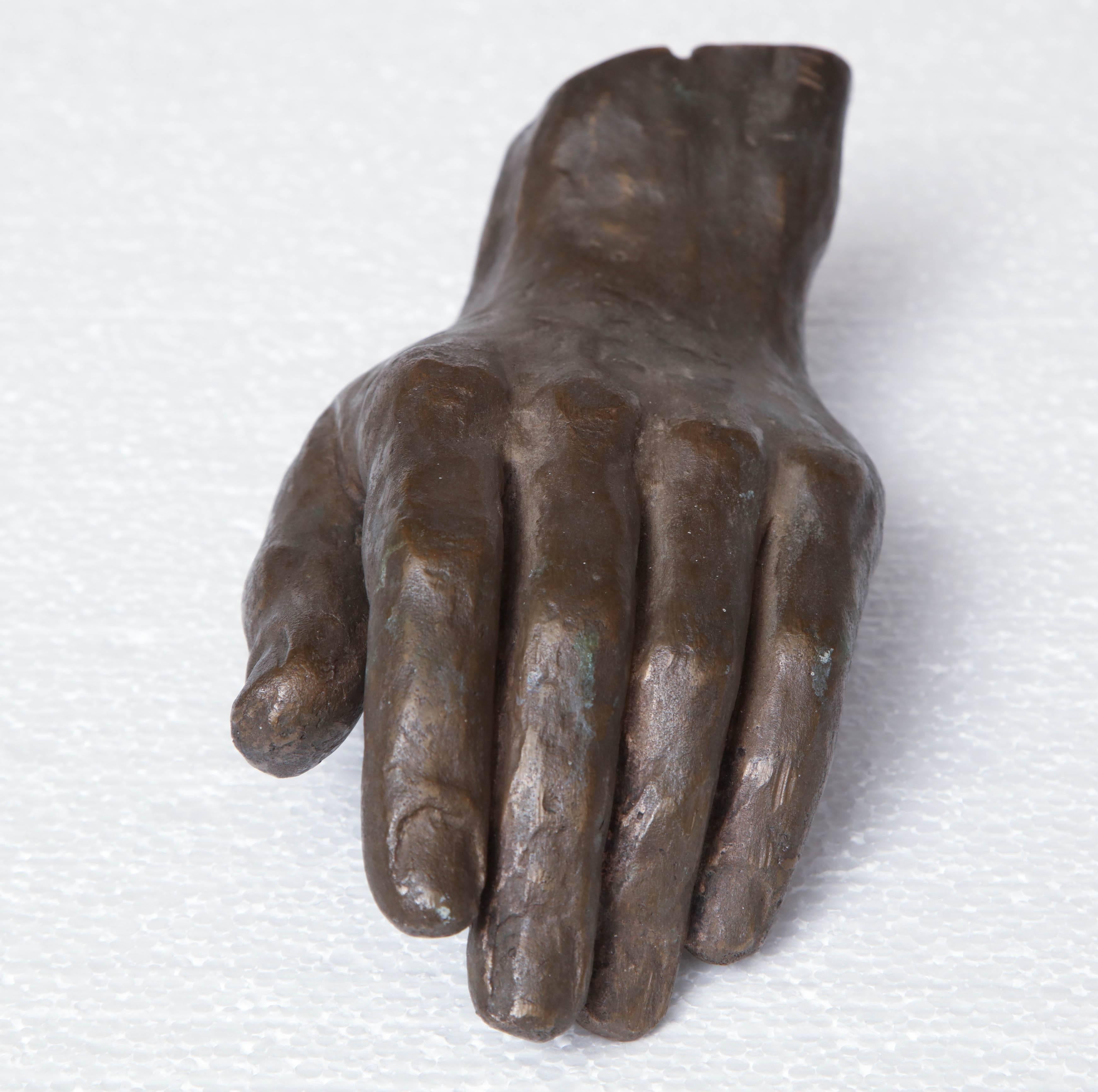 20th century bronze hand.