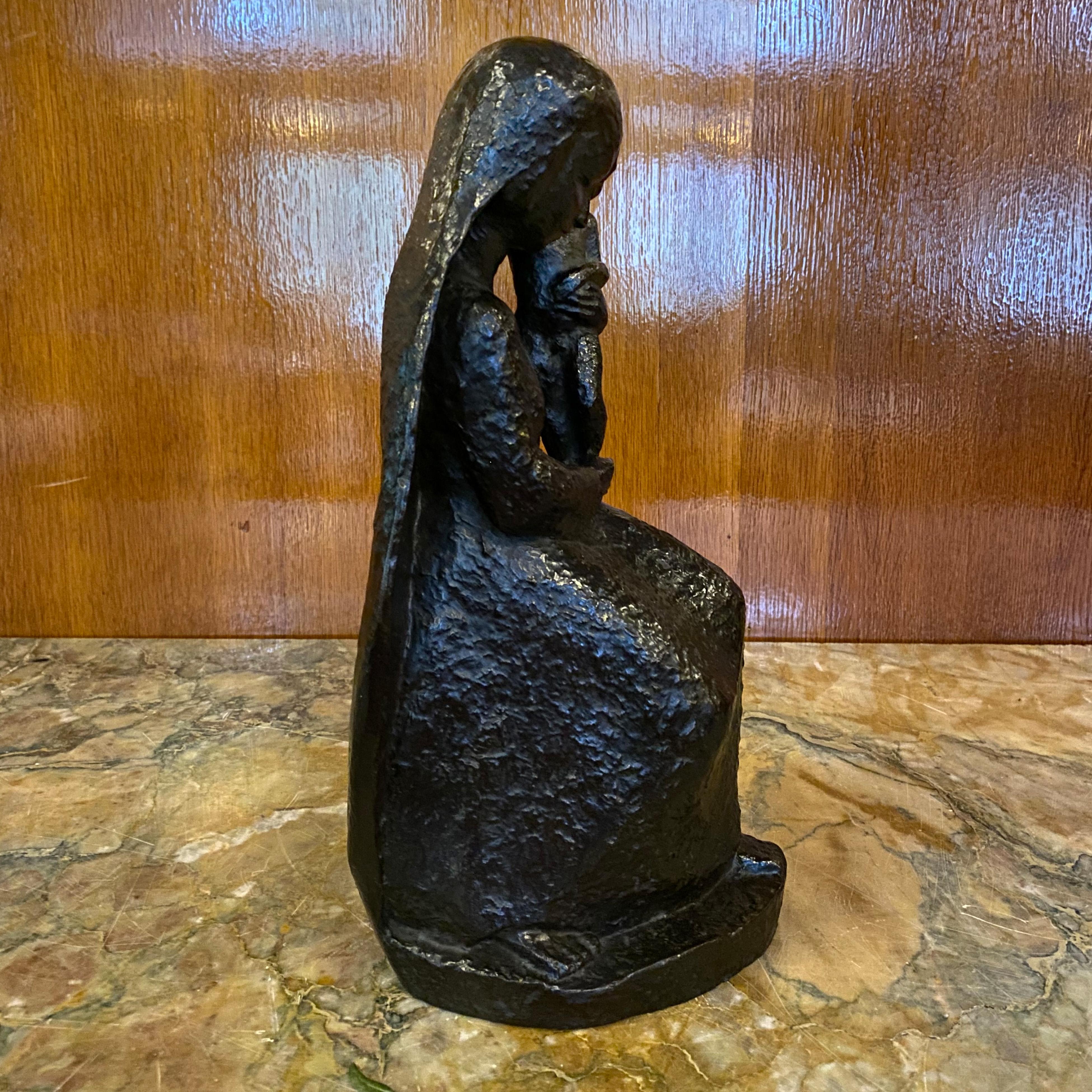 20th century sitted bronze Madonna with child.