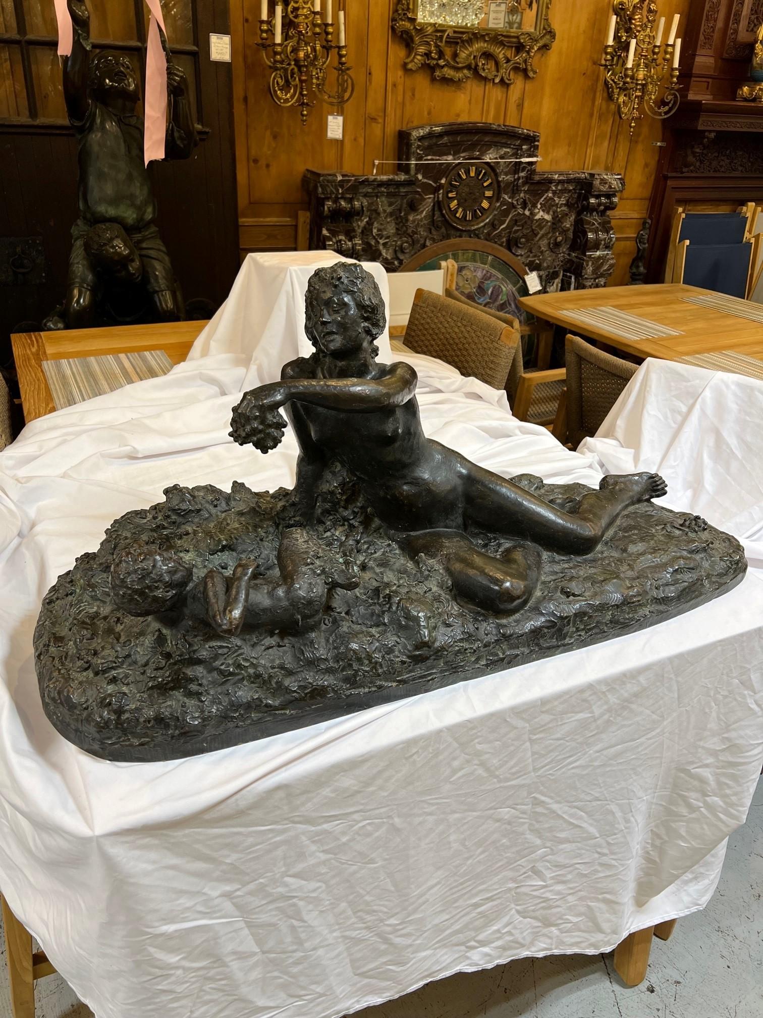 A wonderful bronze by George Conlon ( 1888-1980 ) depicting a nymph feeding grapes to a baby satyr. Cast in Paris at the Claude Valsuani foundry in Paris, known for their castings for Renoir, Bourdelle, Daumier, Picasso, Pompon, and many other