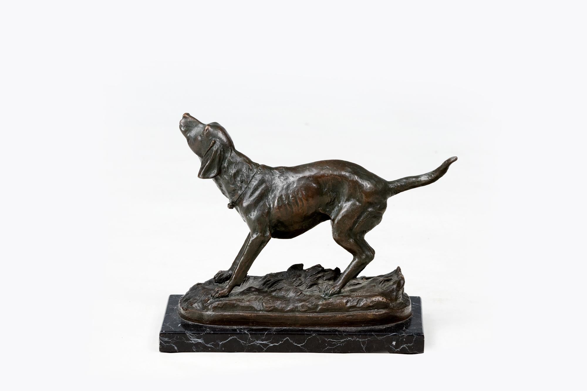 20th Century Bronze Sculpture of a Hunting Dog by the artist Miguel Fernando López (Milo). Depicting an alert dog on a naturalistic base signed 'Milo'. Raised on a black marble plinth.