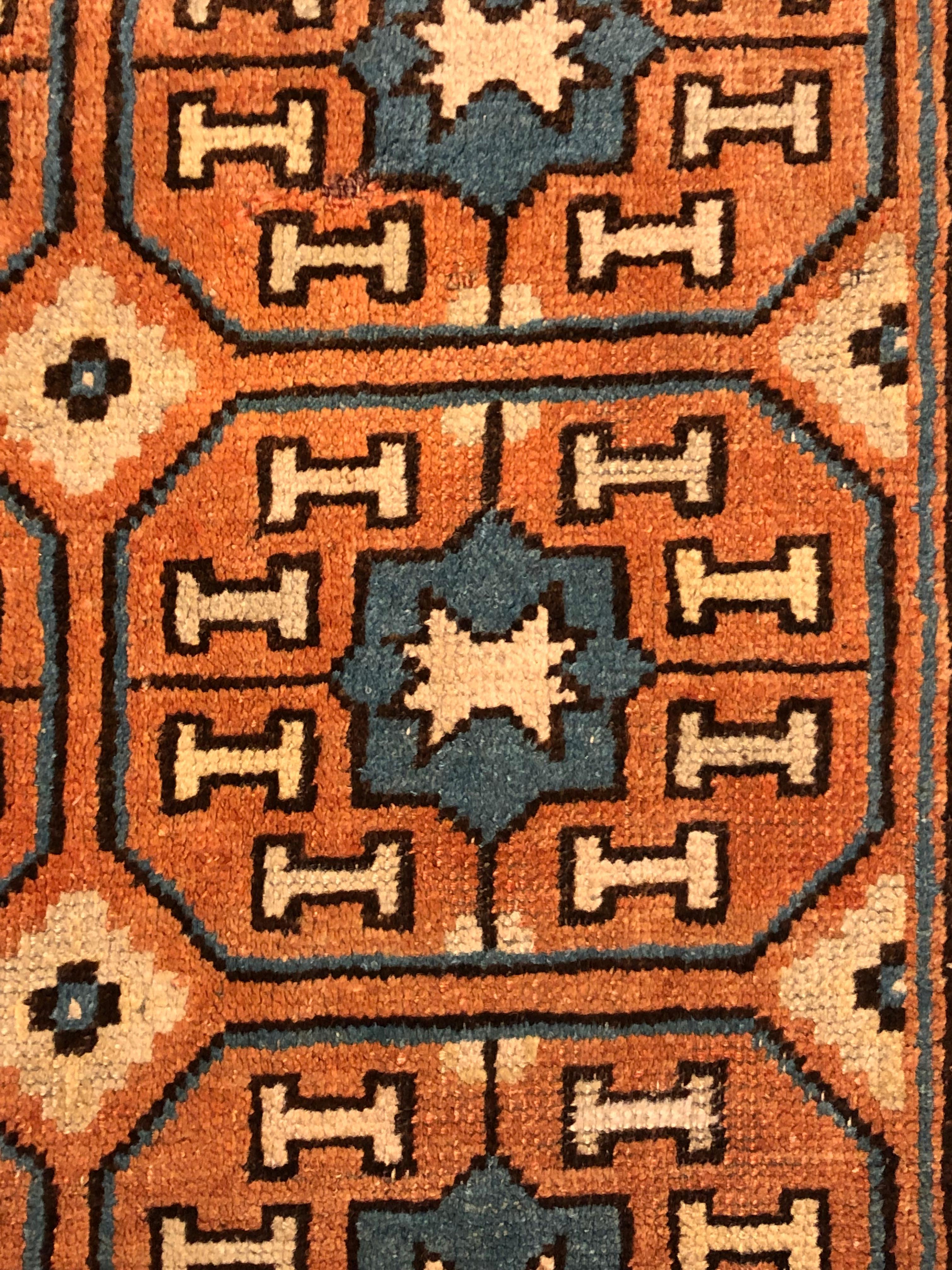 19th Century Brown and Blue Stylized Rosette Gul Chinese Khotan Rug, circa 1870s For Sale 8