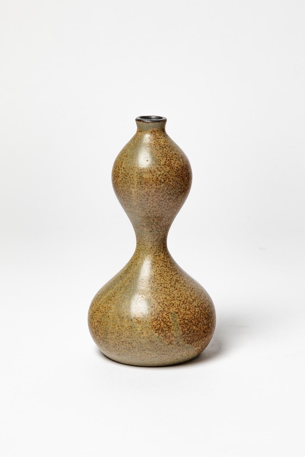 Jacques Lacheny

Réalisé à Saint Amand en Puisaye

Vase original en céramique fait à la main 

réalisé vers 1970

Vase en céramique brun/gris et noir

Signé

Condition originale parfaite.

hauteur 17 cm
Grand 9 cm