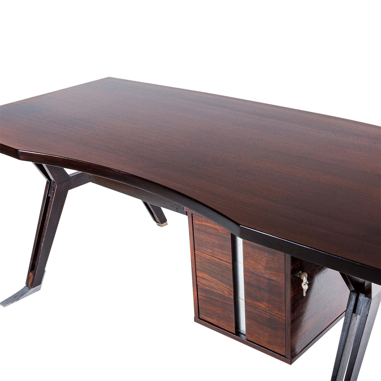 A vintage Mid-Century Modern Italian writing, office table with a large top, made of hand crafted polished Rosewood, designed by Ico Parisi and produced by MIM Roma, in good condition. The freestanding desk is composed with a flat extension, in the
