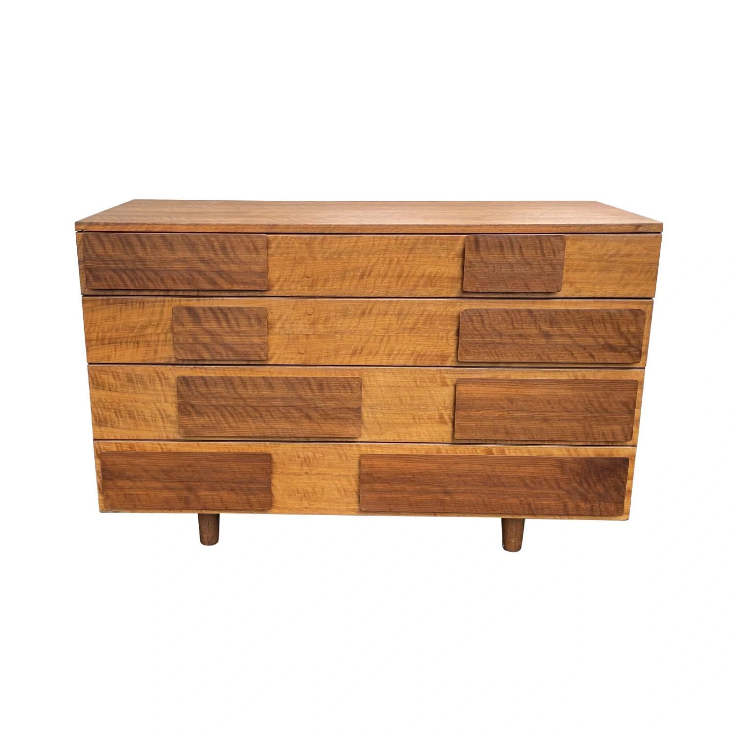 A light-brown, vintage Mid-Cenutry Modern Italian, American geometric dresser cupboard made of hand crafted polished walnut, designed by Gio Ponti and produced by M. Singer & Sons dresser in New York City, United States. The sculptural chest,