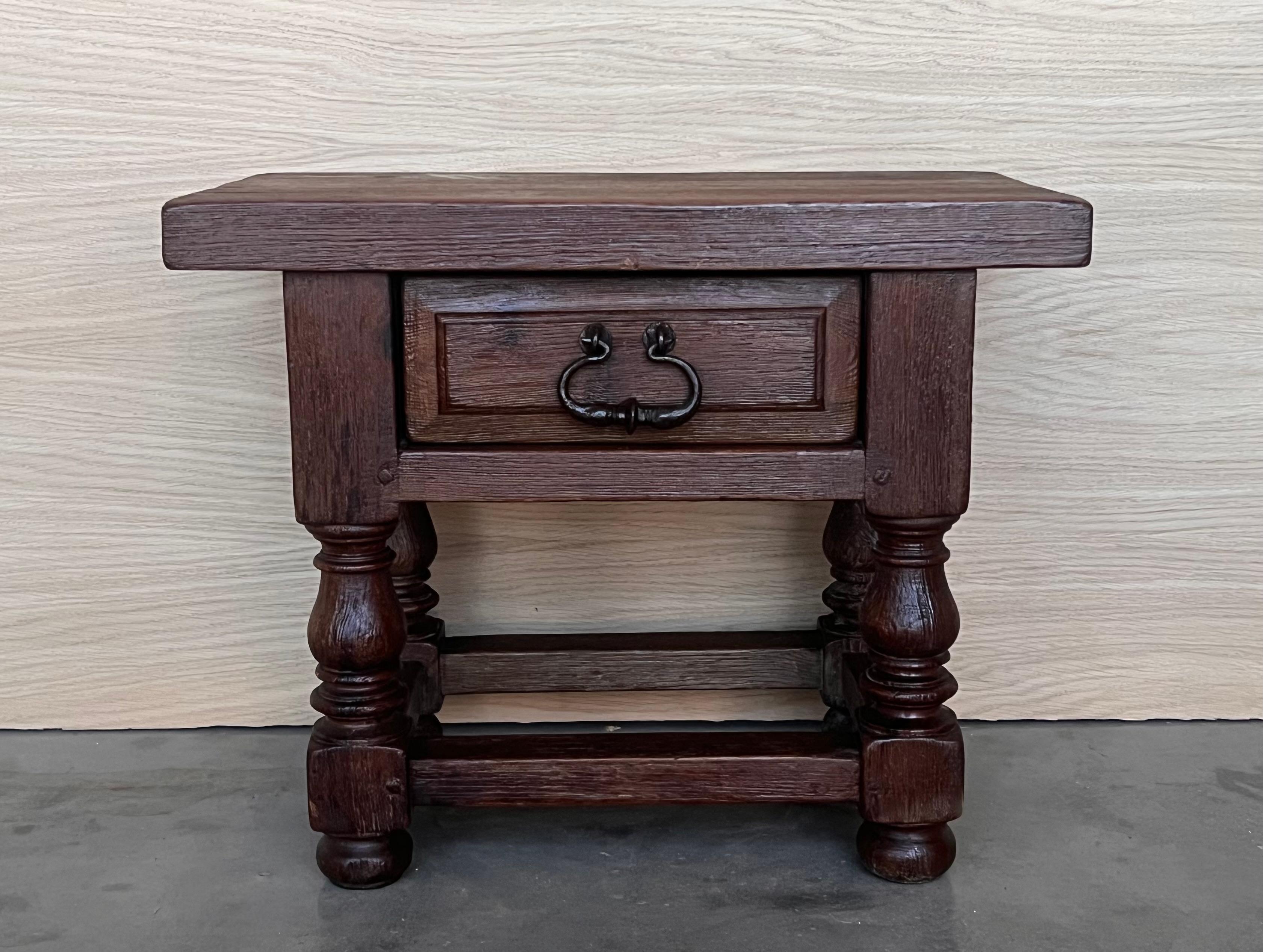 20th century pair of Brutalist Spanish nightstands with carved drawer and iron hardware 
Beautiful tables that you can use like a nightstands or side tables, end tables... or table lamp.