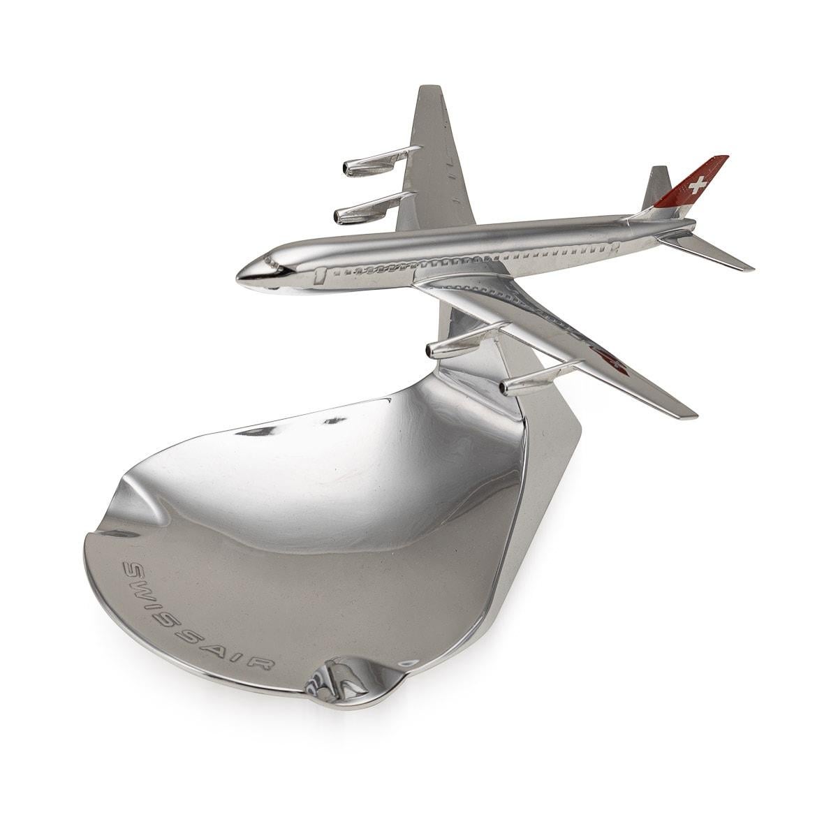 A rare collection of mid 20th Century air travel ashtray souvenir gifts from a selection of airline companies based in Europe. All are made in cast metal by Buhler. This collection includes an English Concorde as well as passenger planes from Swiss