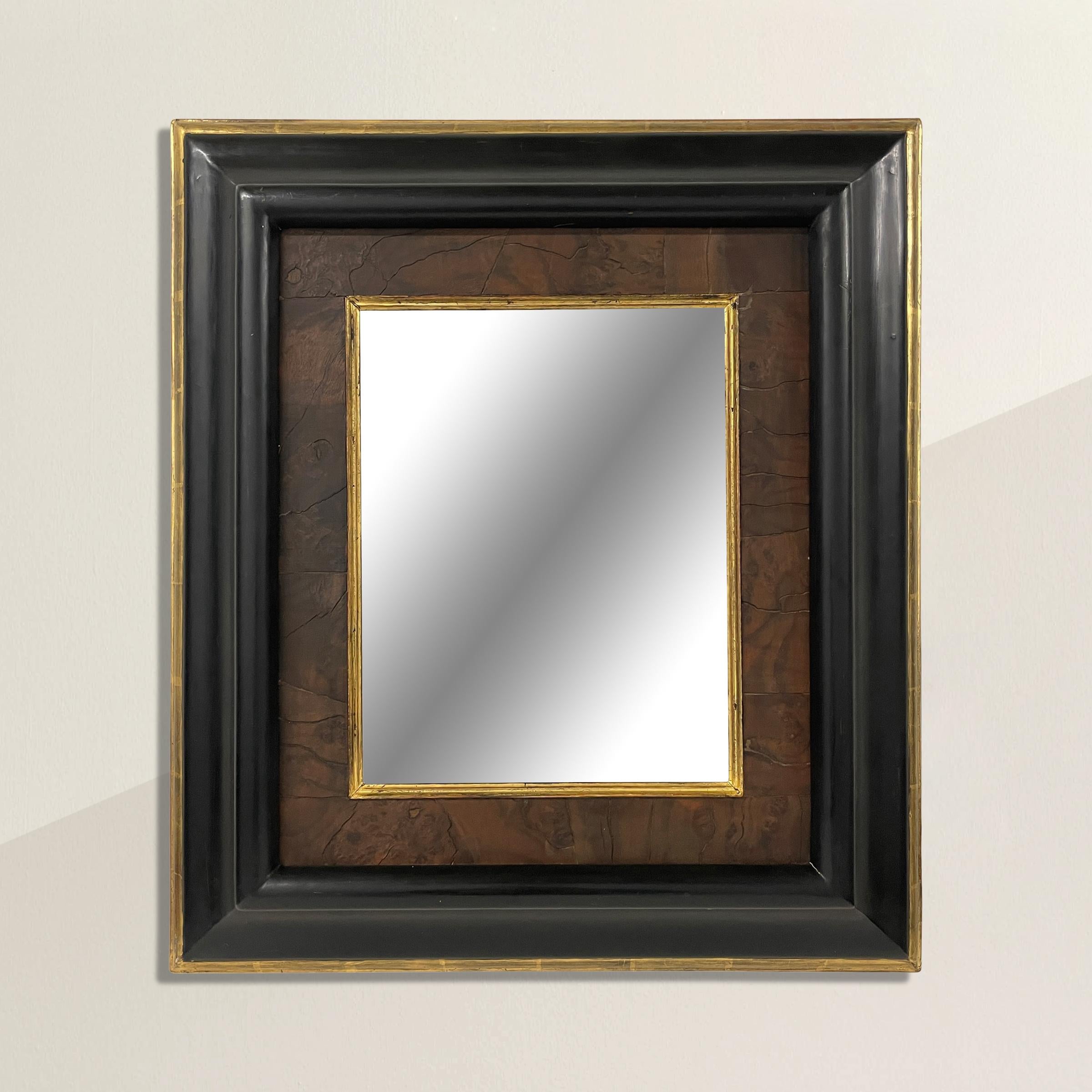 Un miroir à cadre américain intemporel du 20e siècle avec un profil profond, un filet de bois de ronce avec un bord en feuille d'or. Parfait au-dessus du lavabo dans votre salle d'eau, au-dessus d'une console dans votre entrée, ou n'importe où