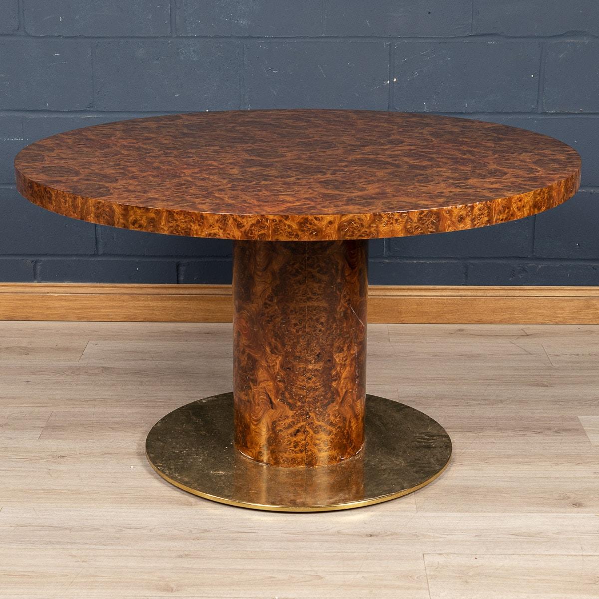 A large burled walnut veneer dining table by Willy Rizzo, made in Italy towards the end of the 1960s to early 1970s. The clean lines and luxurious feel are characteristically Willy Rizzo and this dining table embodies this spirit. Measuring an