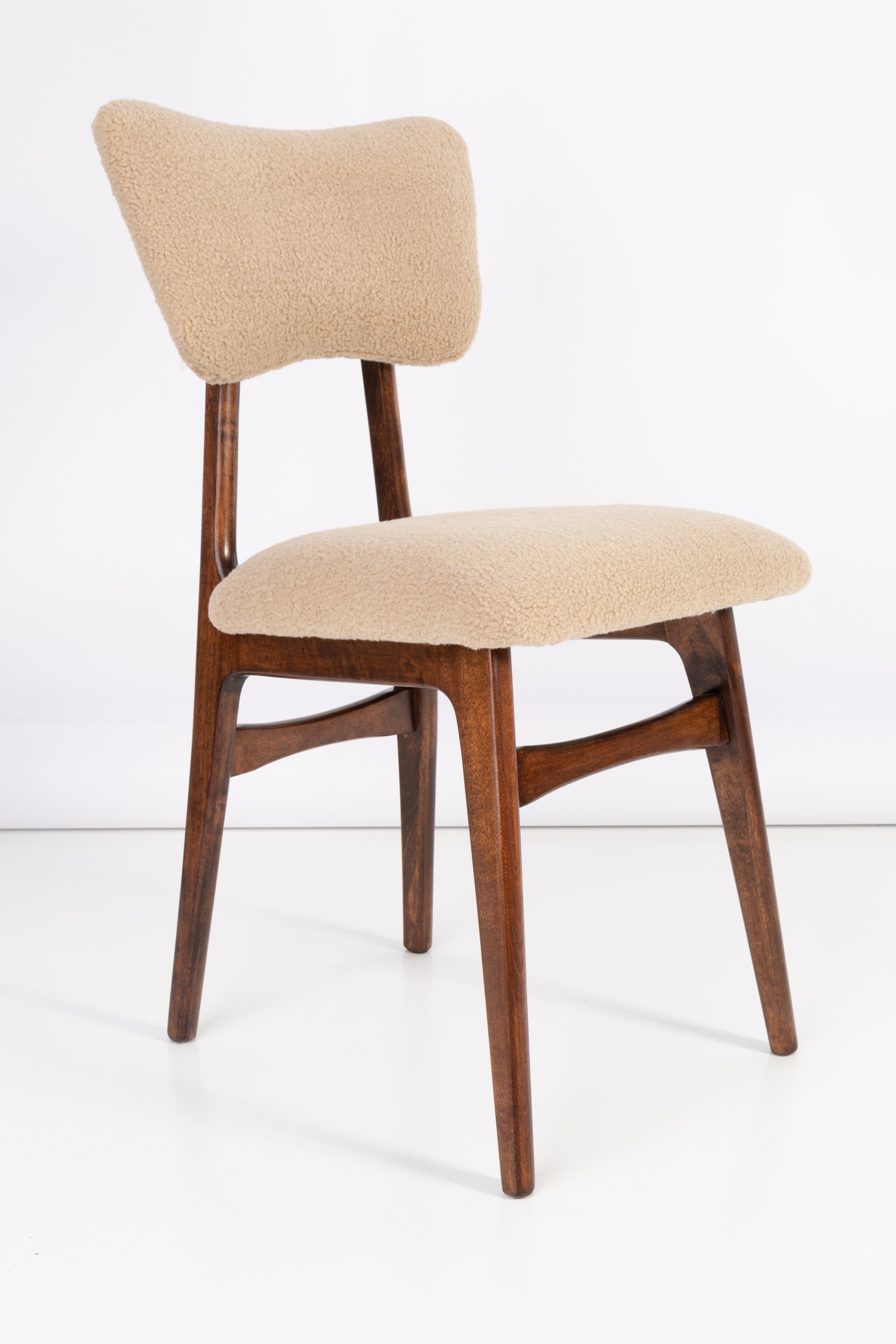 Chair designed by Prof. Rajmund Halas. Made of beechwood. Chair is after a complete upholstery renovation, the woodwork has been refreshed. Seat and back is dressed in camel, durable and pleasant to the touch boucle fabric. Chair is stable and very