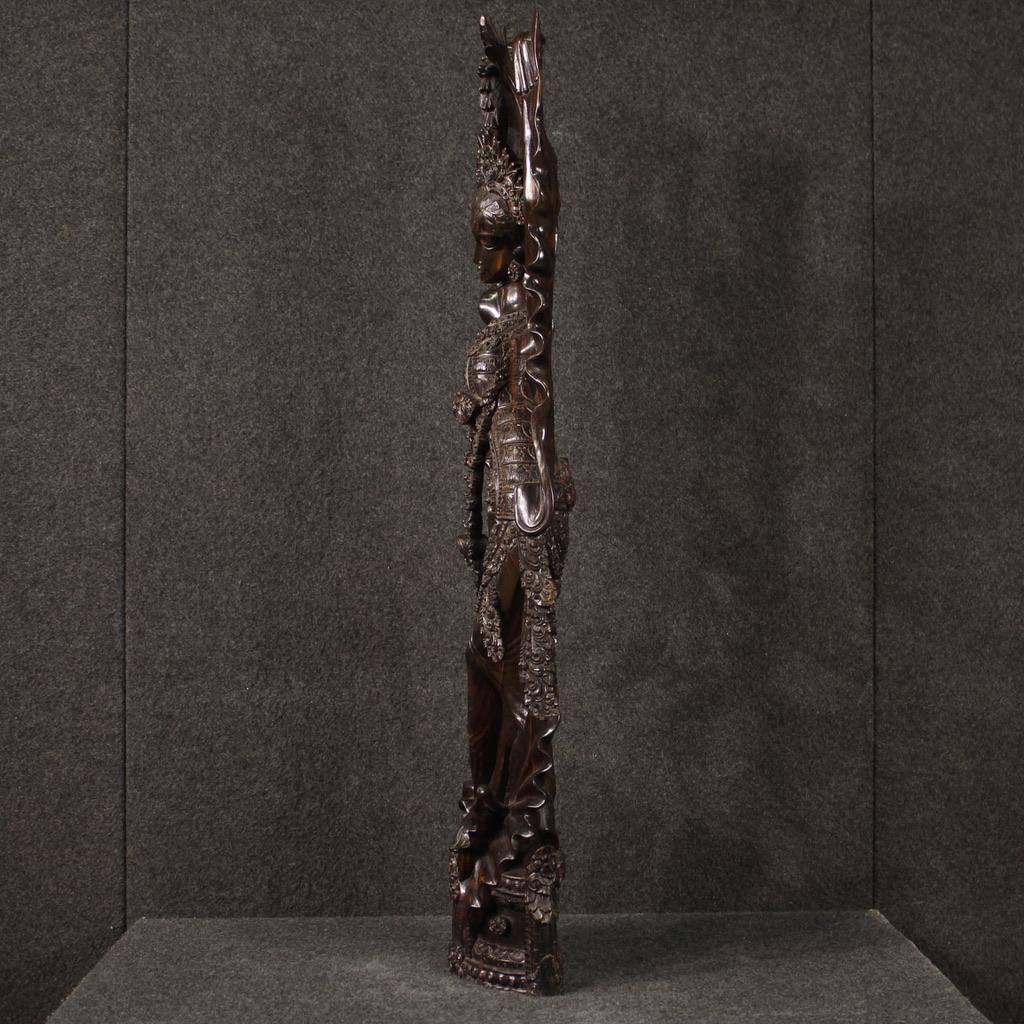 Indonesian sculpture from the second half of the 20th century. Finely carved and crafted exotic wooden object depicting an oriental dancer of excellent quality. Sculpture made from a single wooden block. Nicely sized work, ideal for inclusion in a