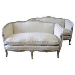 Antique 20th Century Carved and Painted Settee Upholstered in Belgian Linen
