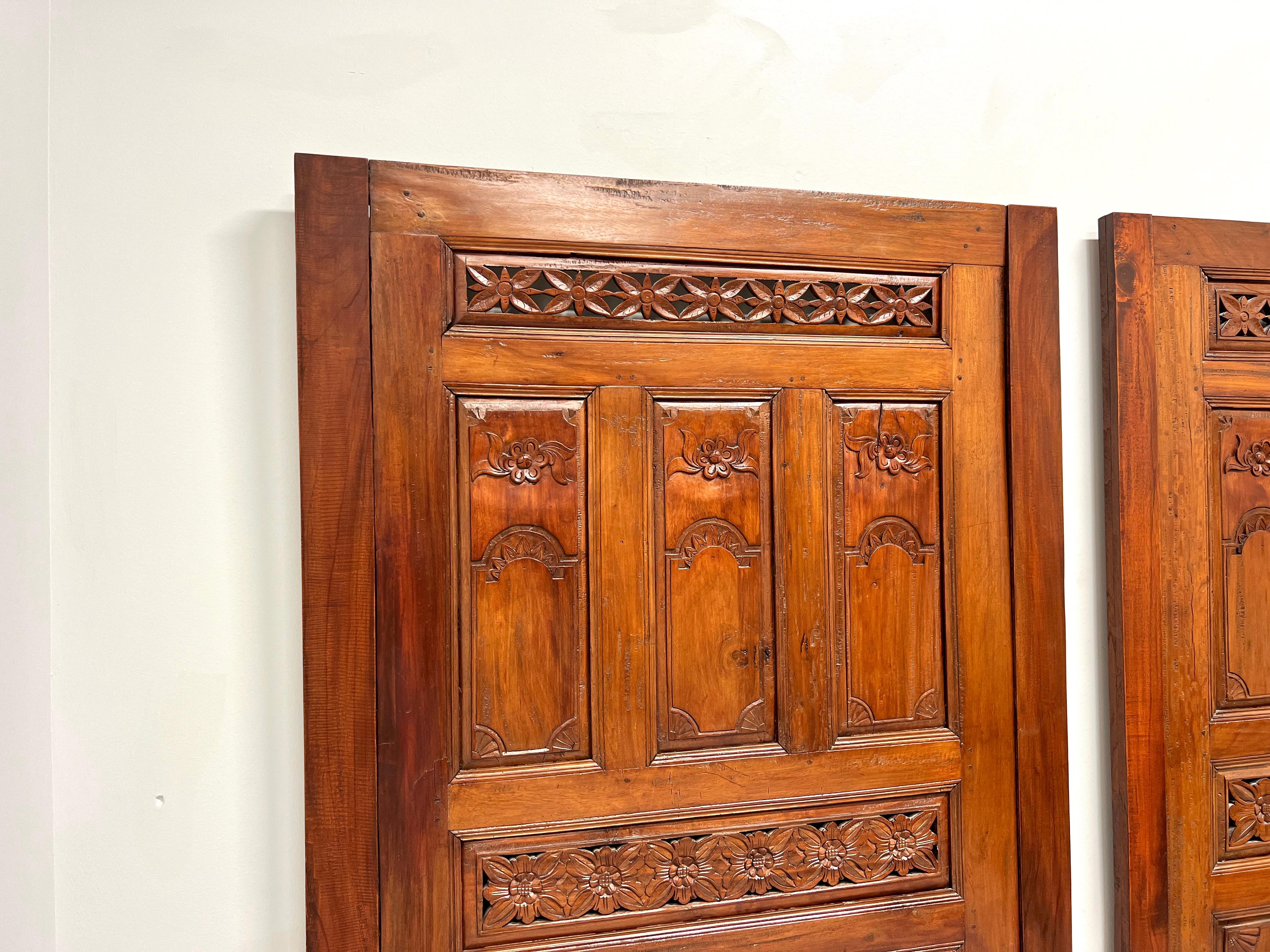 Indonesian 20th Century Carved Balinese Mahogany Doors Converted to Headboards - Pair For Sale
