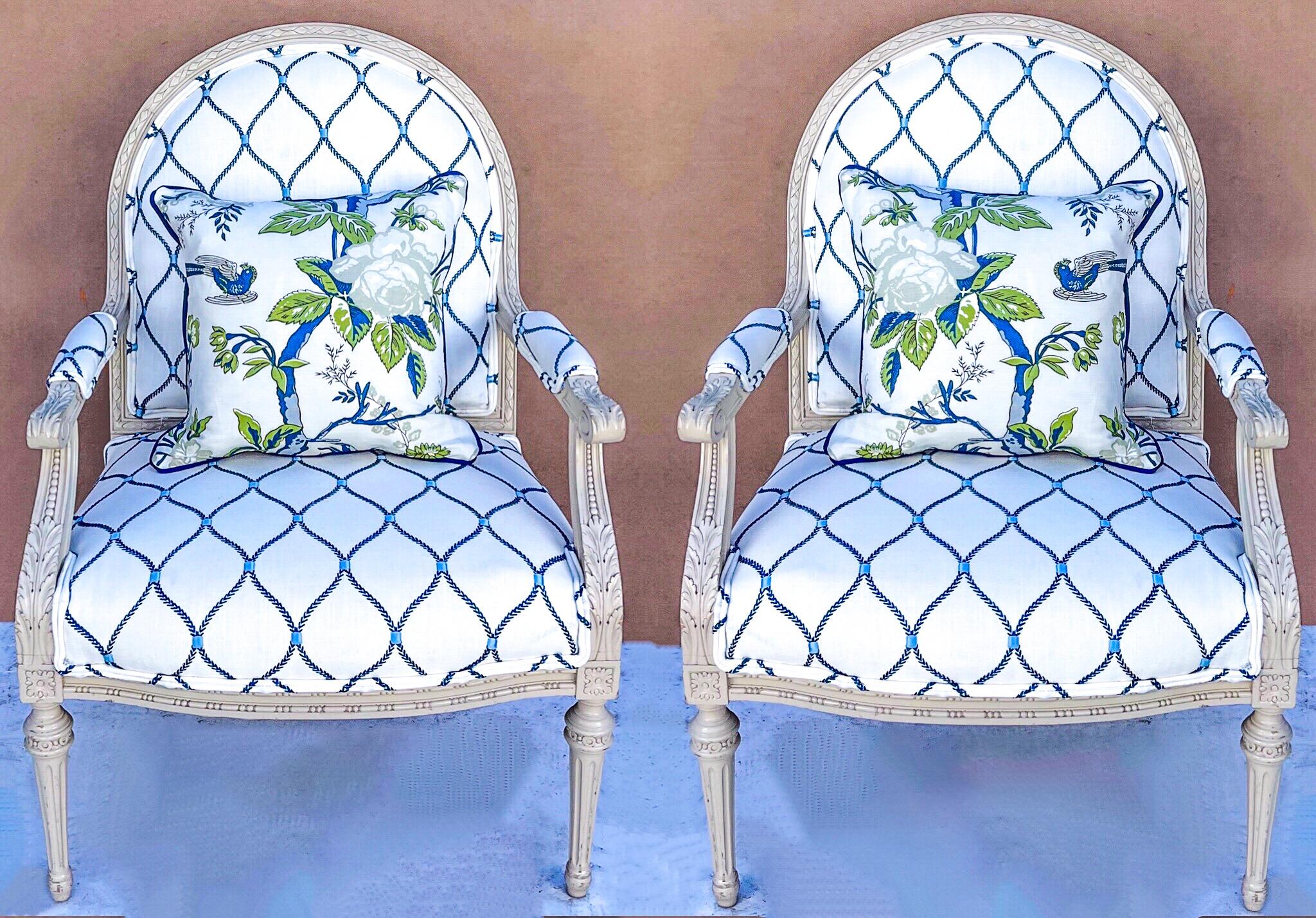 These check all the boxes! They are are pair of French Louis XV style bergere chairs that have been reupholstered and accessorized with a down pillow in a Travers fabric. The chair fabric is an embroidered cotton-linen blend. The pillow is a fresh