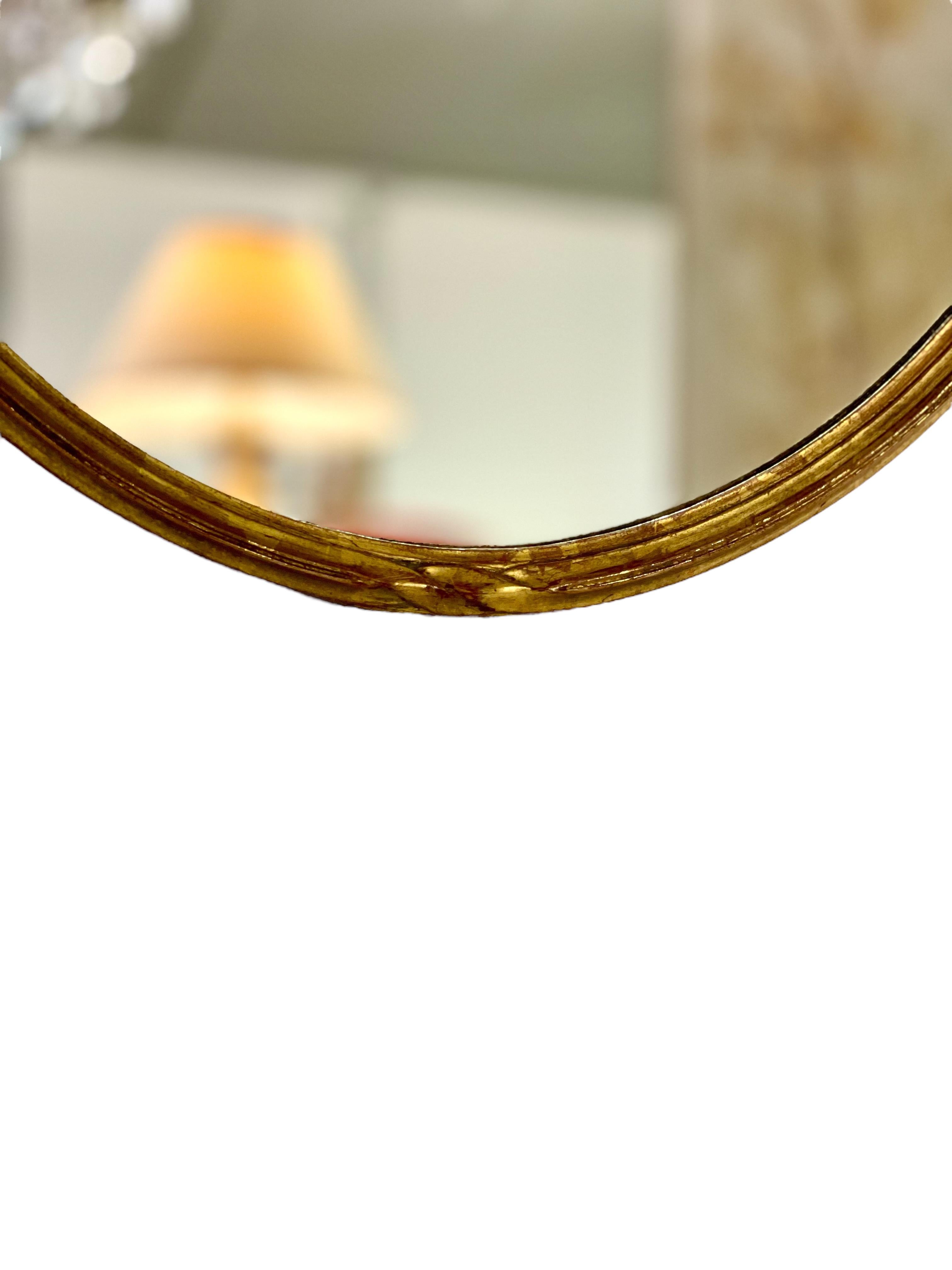 French 20th Century Carved Giltwood Oval Wall Mirror For Sale