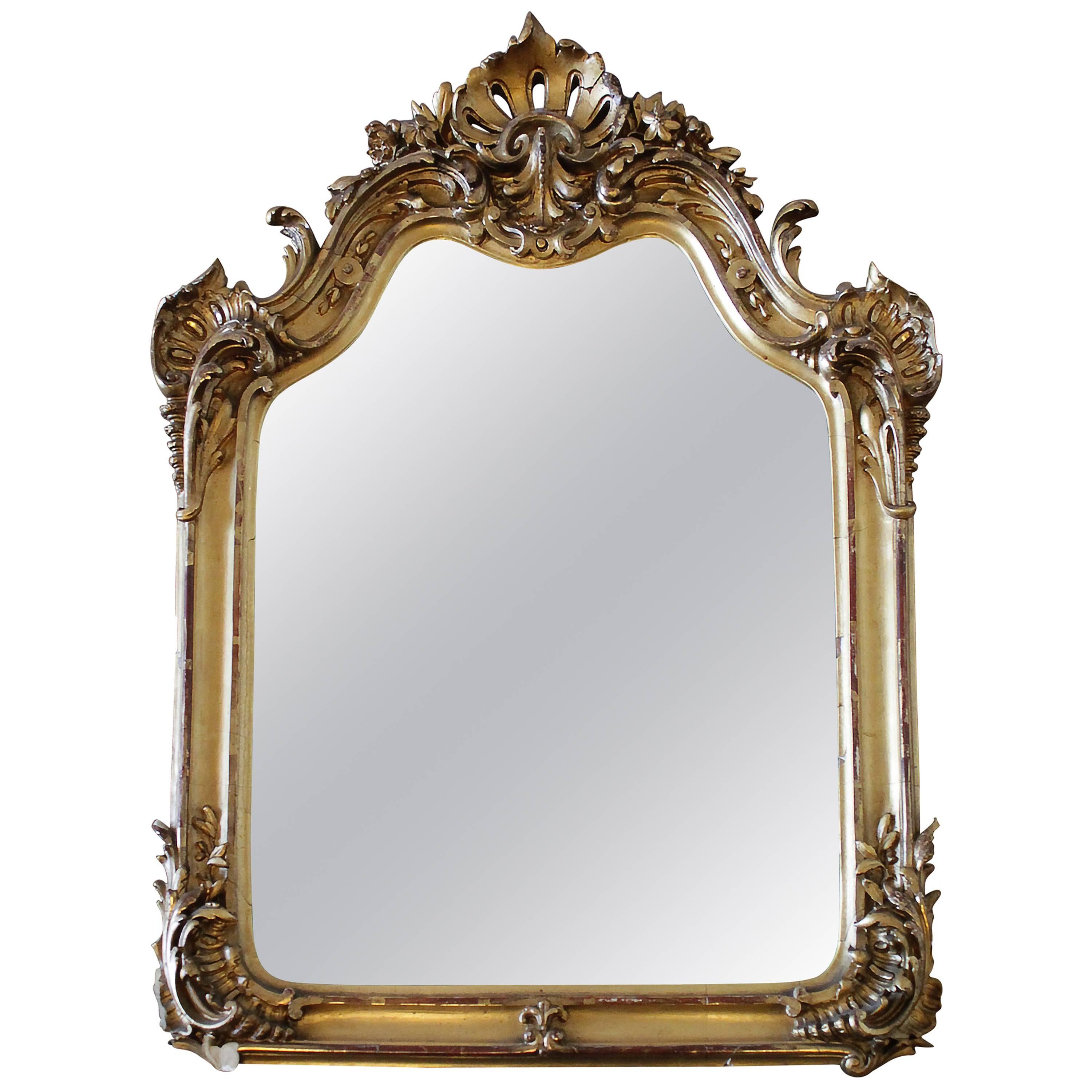 Geschnitzter Spiegel aus vergoldetem Holz im Louis XV.-Stil des 20. Jahrhunderts im Angebot